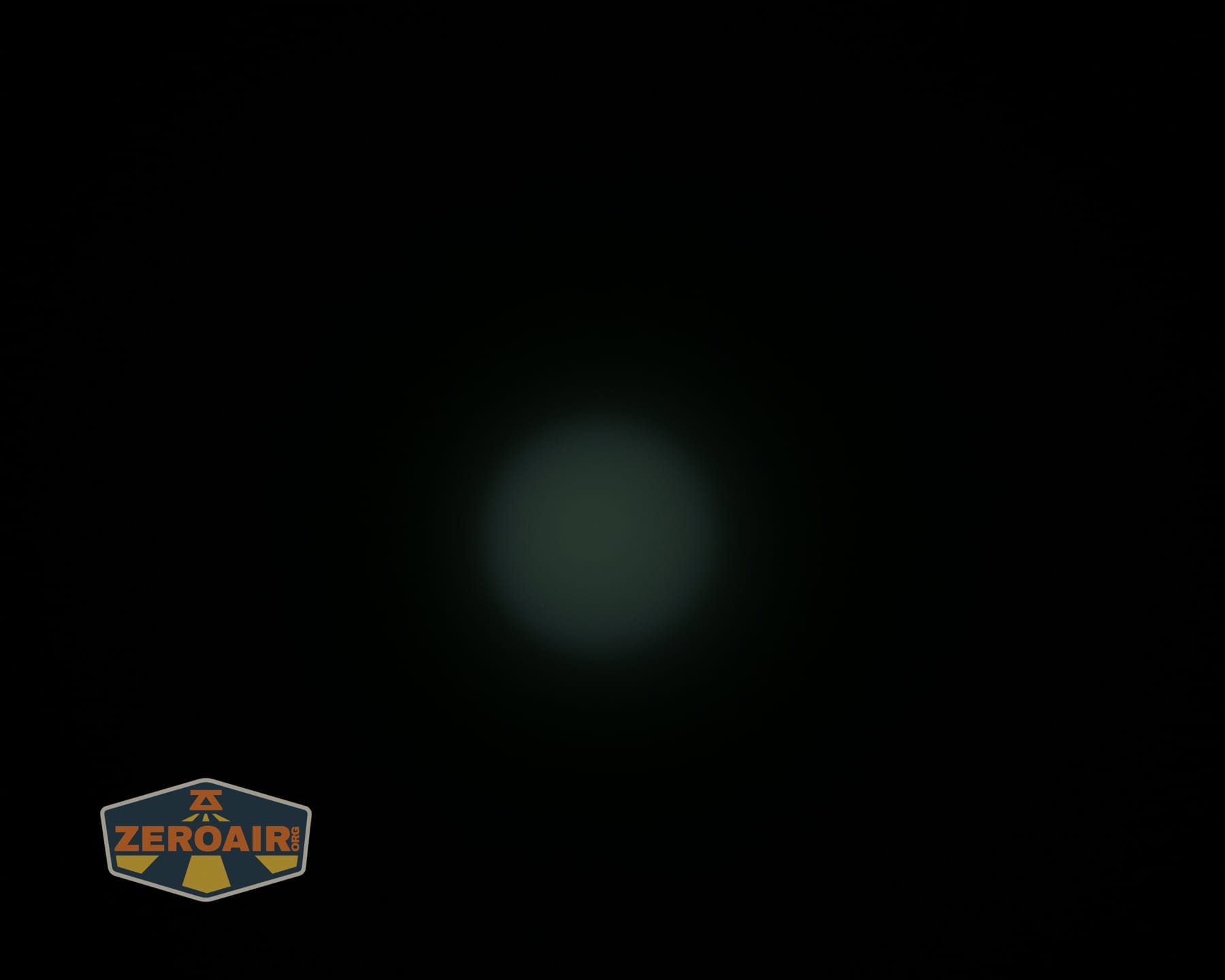 Olight Arkpro Stars and Stripes flat flashlight beamshots on ceiling