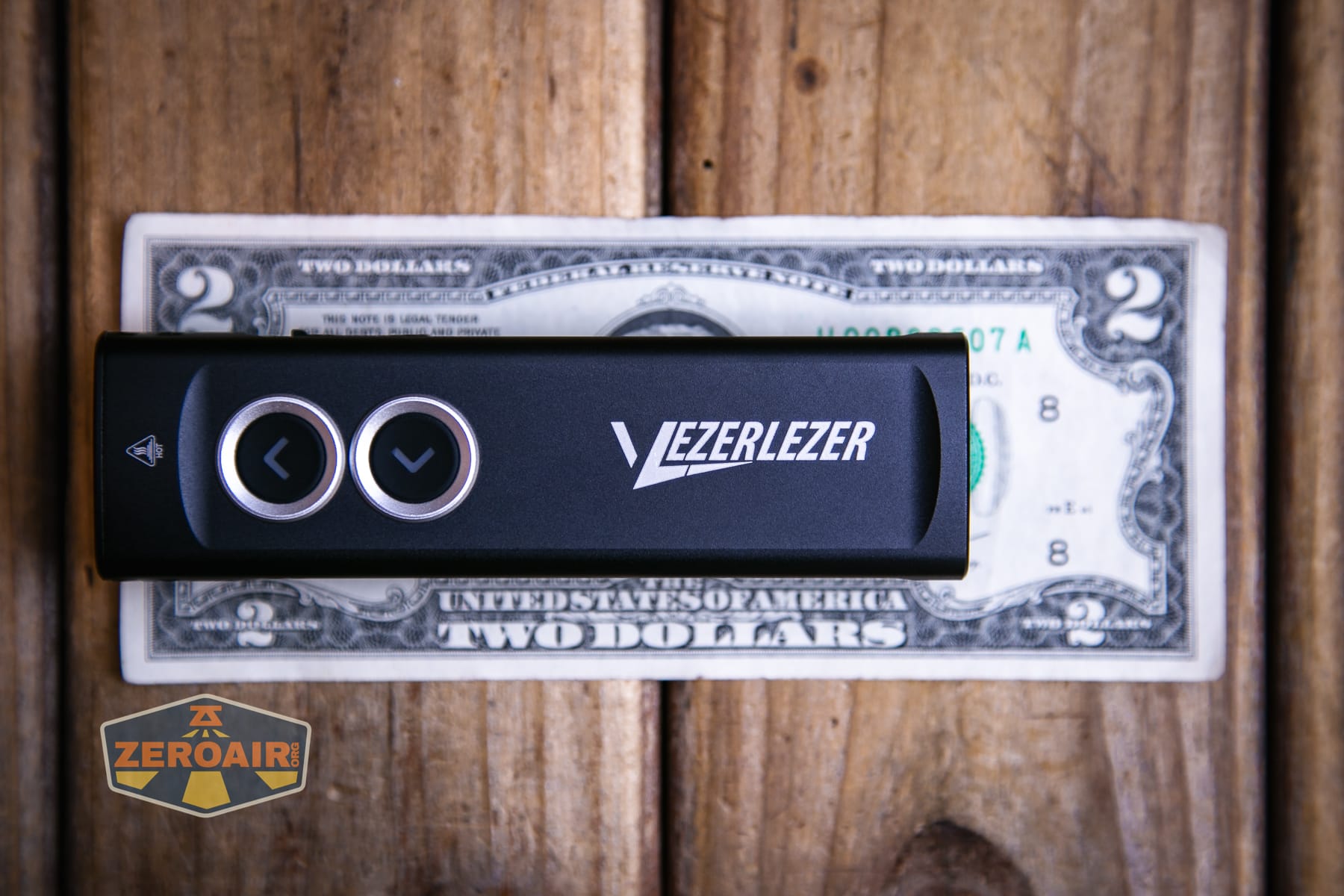 Vezerlezer WK2 flat flashlight on a two dollar bill
