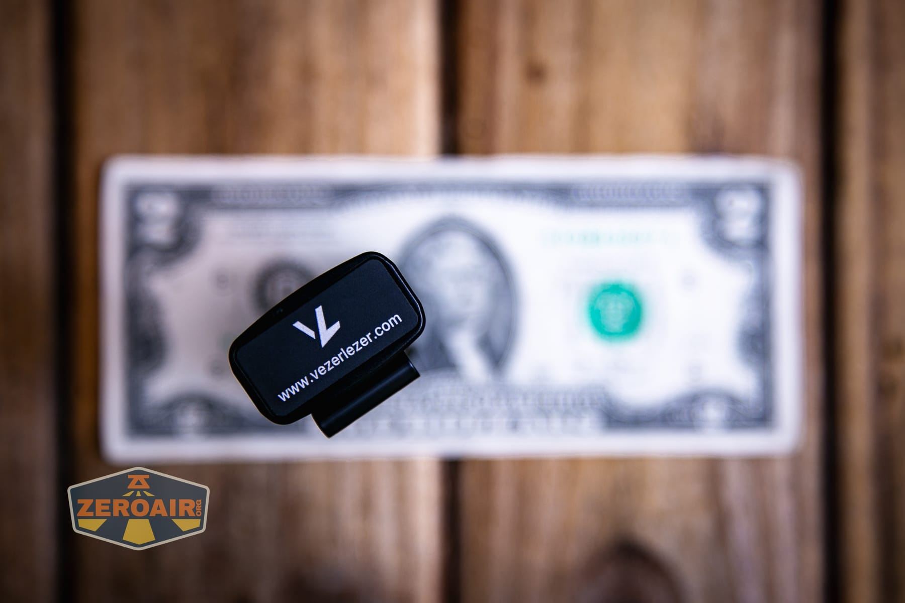 Vezerlezer WK2 flat flashlight on a two dollar bill