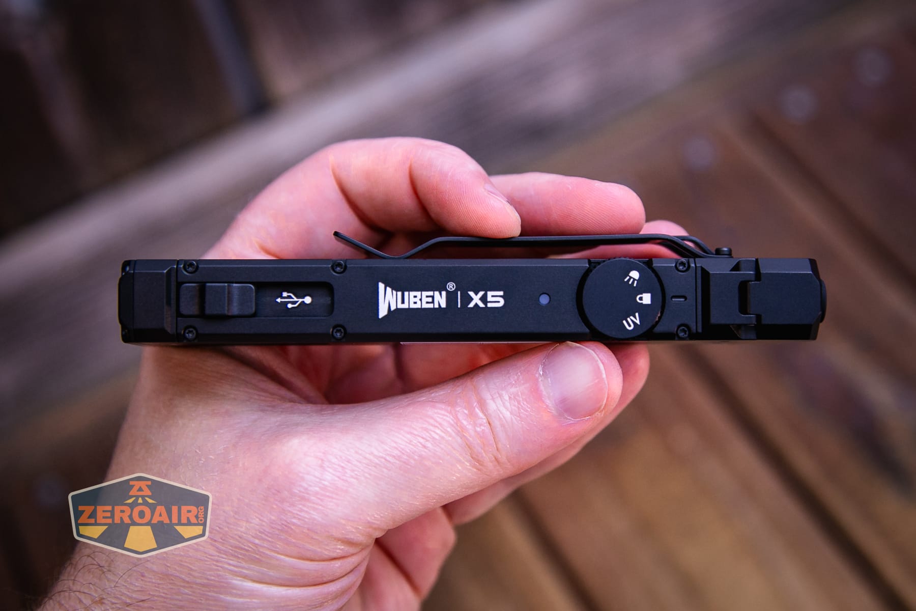 Wuben X5 3-in-1 compact EDC flashlight in hand