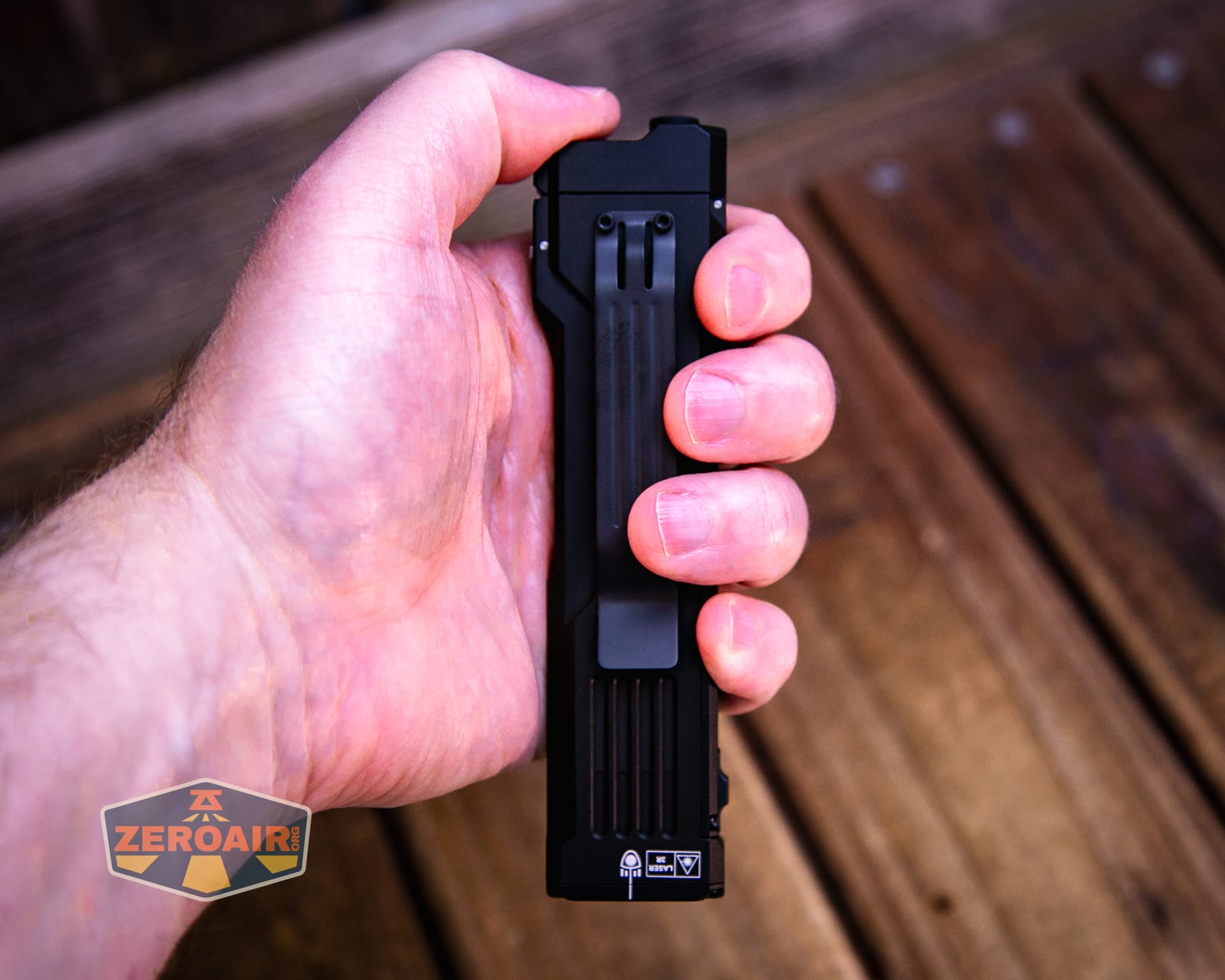 Wuben X5 3-in-1 compact EDC flashlight in hand
