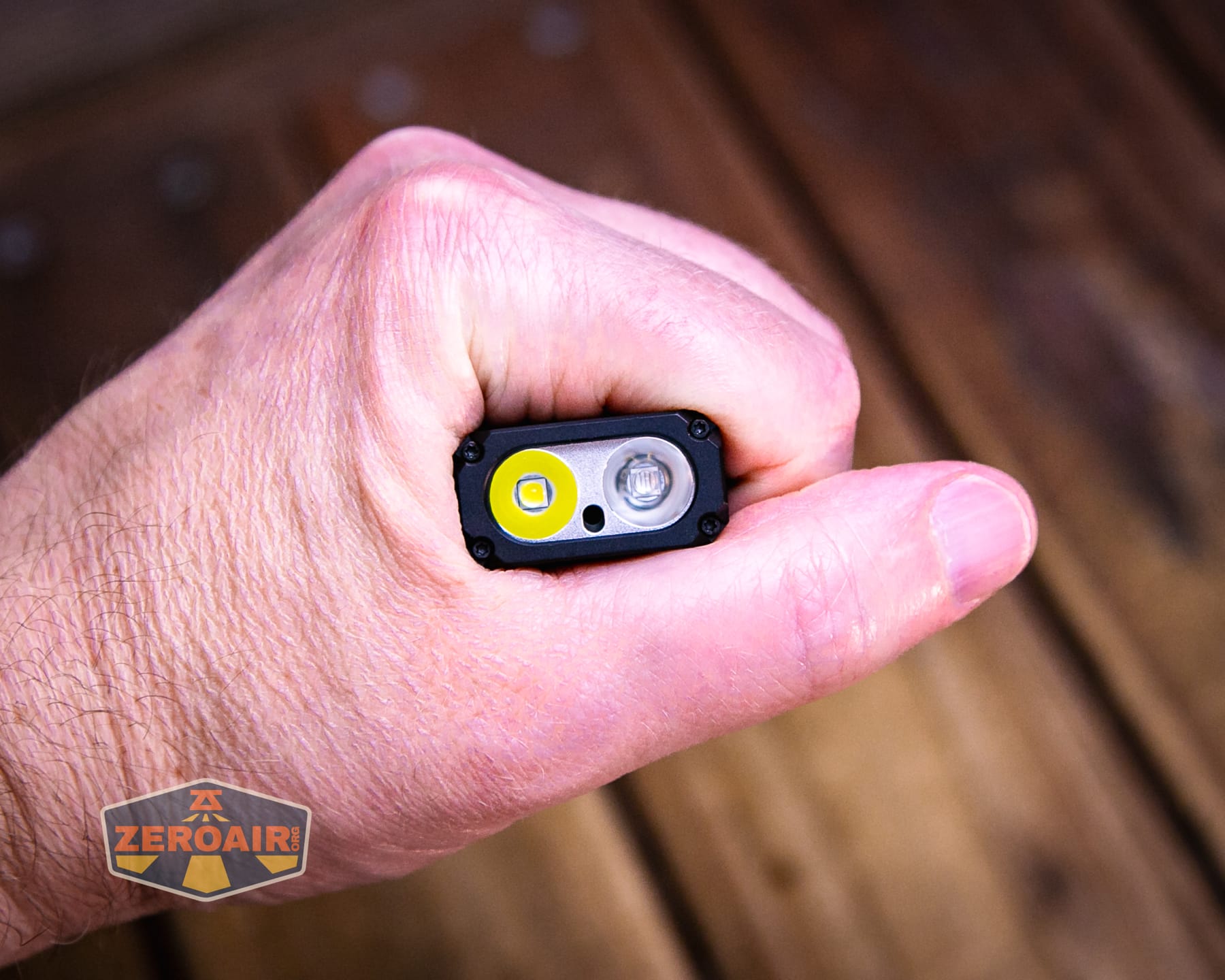 Wuben X5 3-in-1 compact EDC flashlight in hand