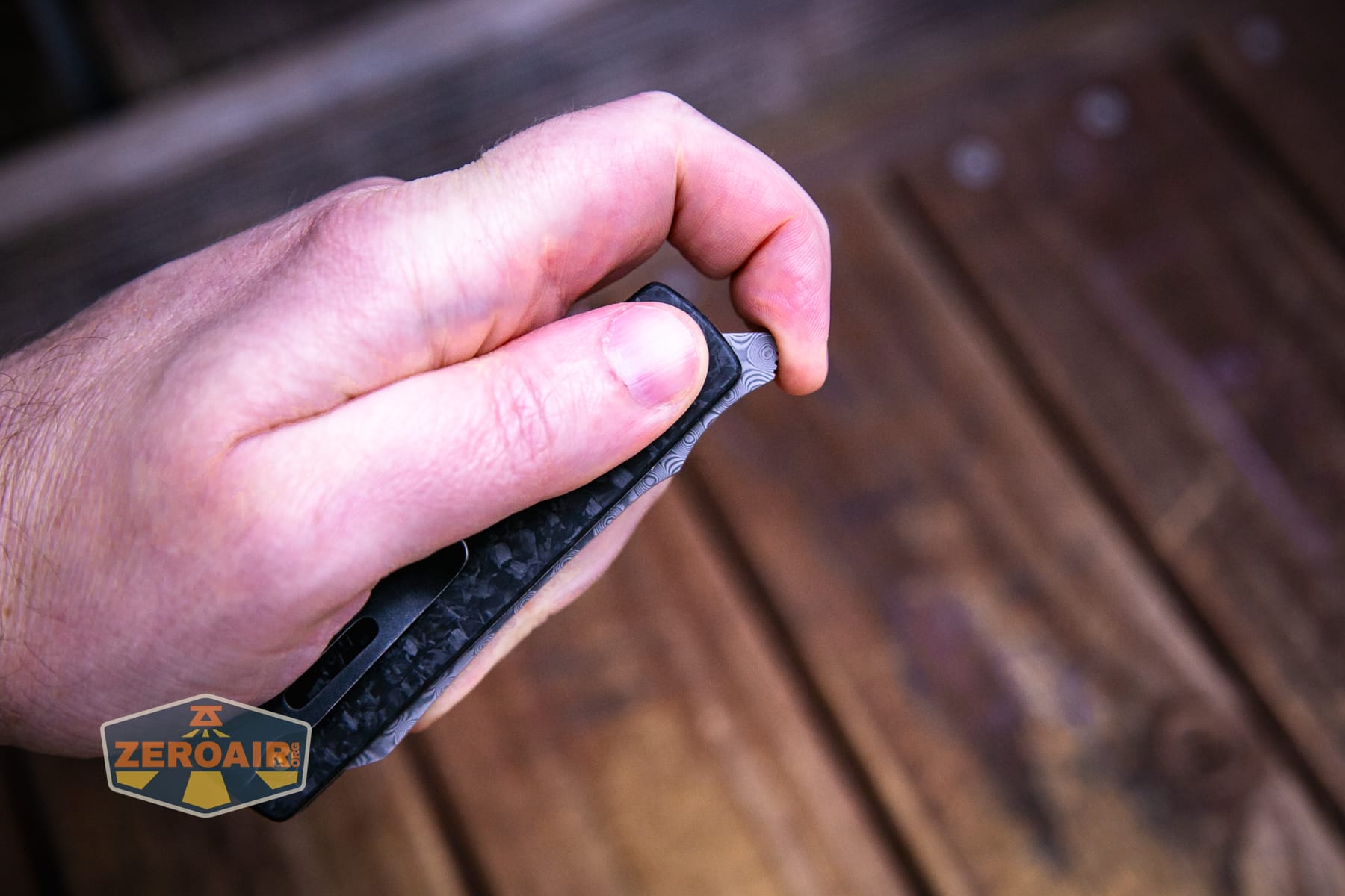 Kansept Higonokami liner lock knife in hand - opening action