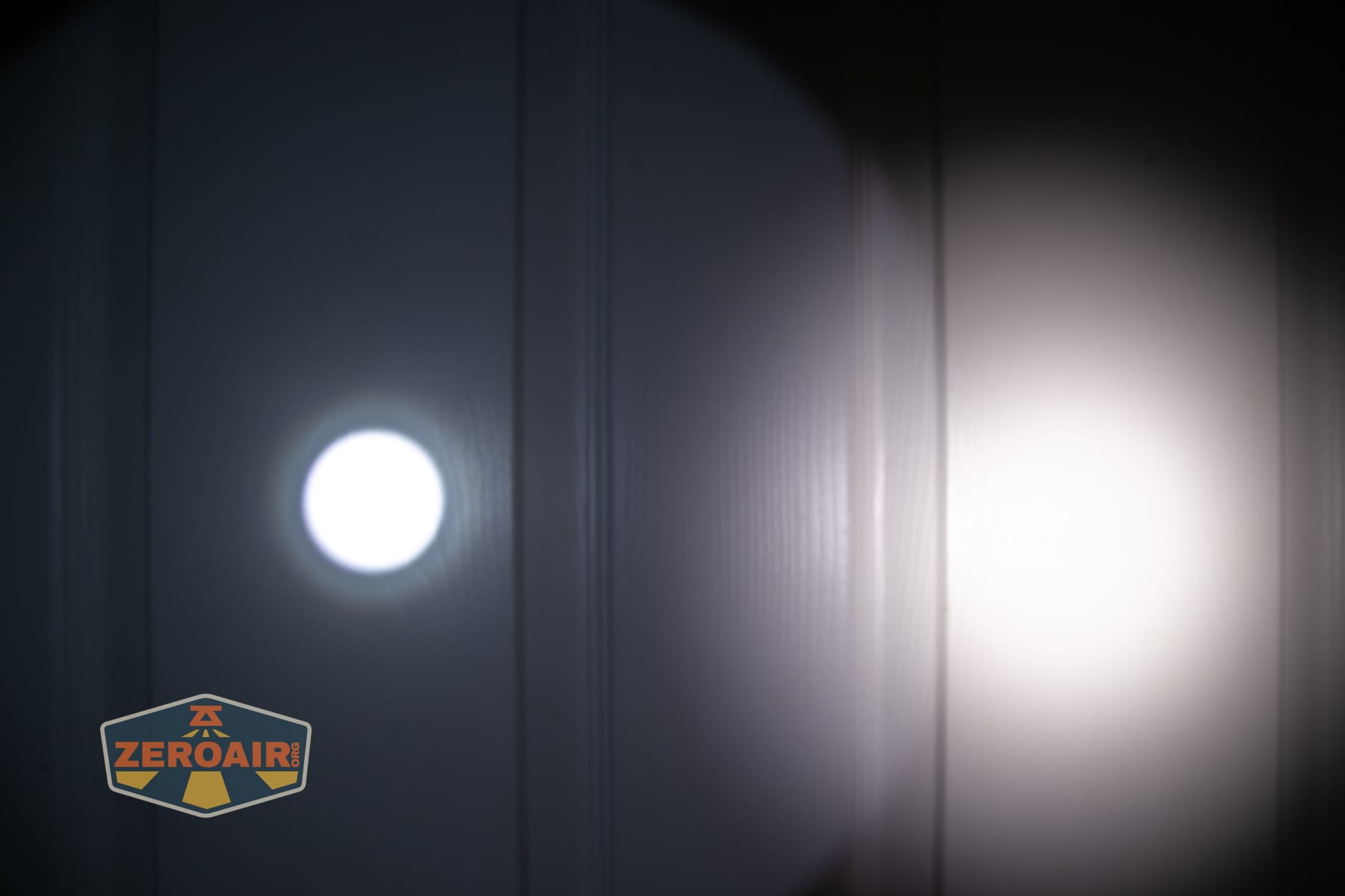 Niwalker N01 Max flashlight beamshots on door (at 1') compared to nichia 219b 4500K