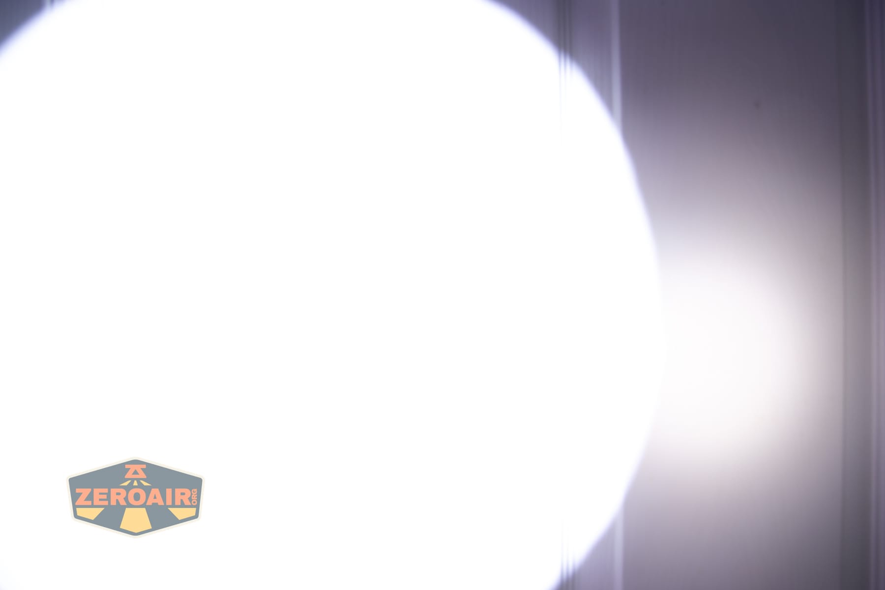 Niwalker N01 Max flashlight beamshots on door (at 1') compared to nichia 219b 4500K
