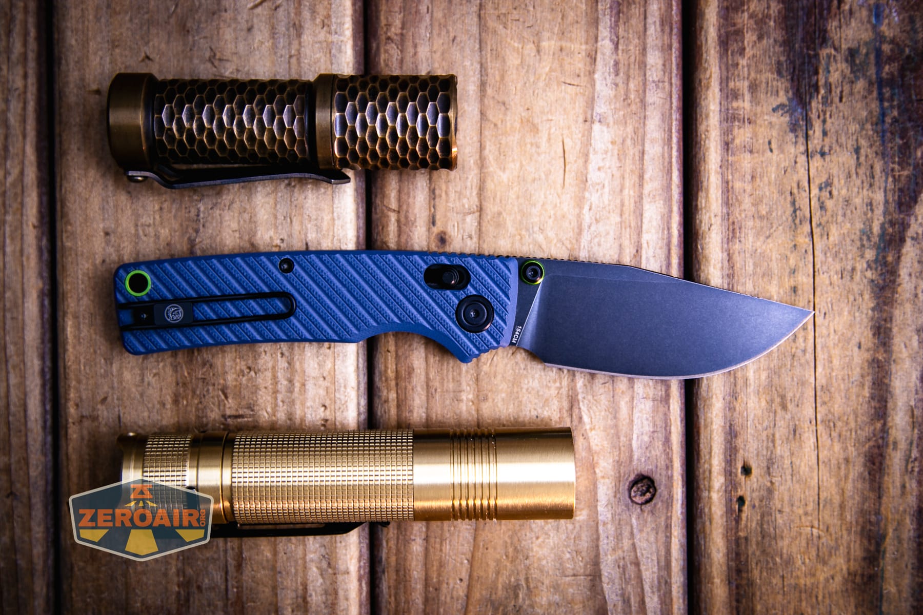 Vosteed Porcupine ModSwap Crossbar lock knife with two standard sized flashlights
