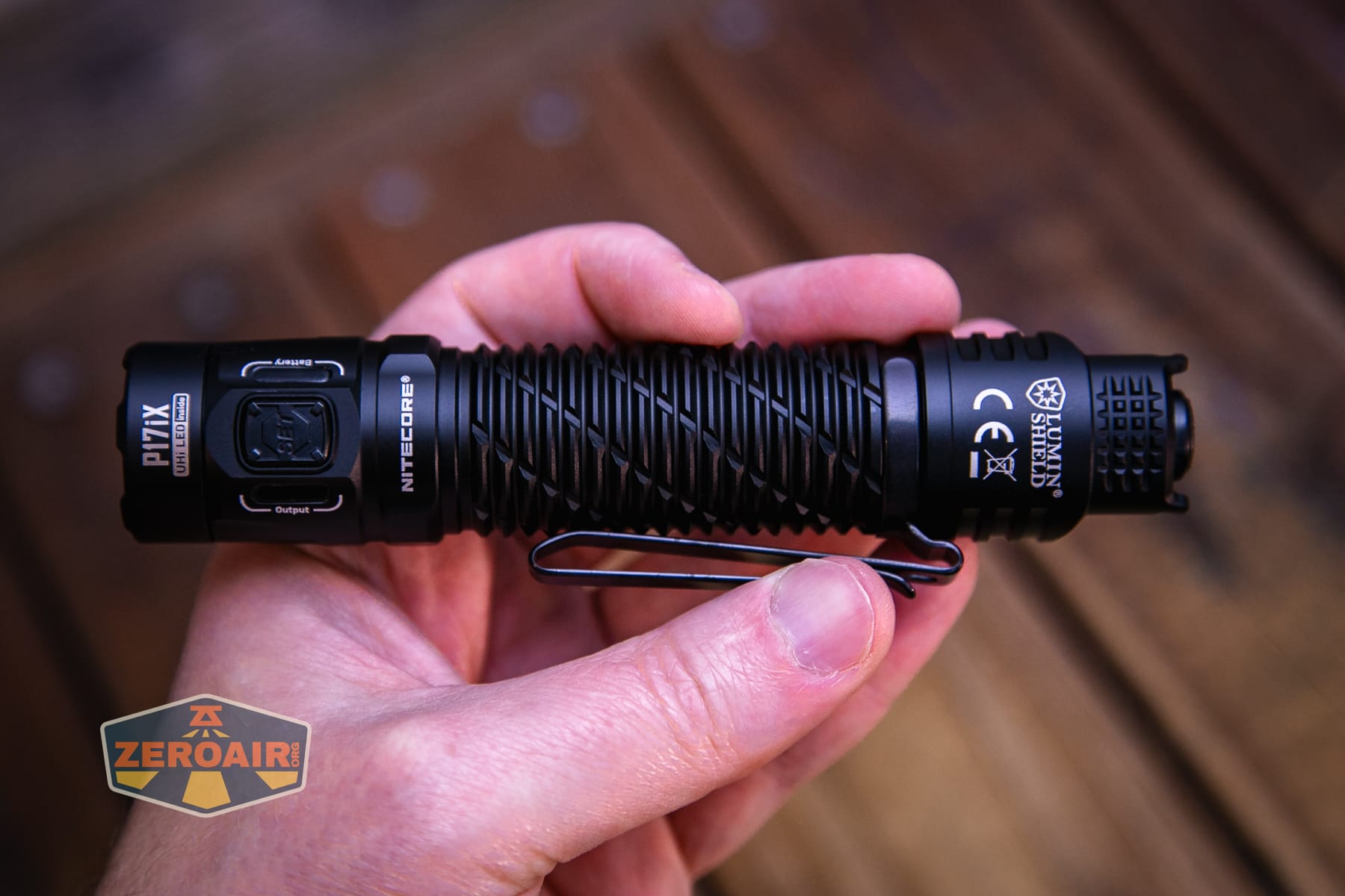 Nitecore P27iX customizable tactical flashlight in hand