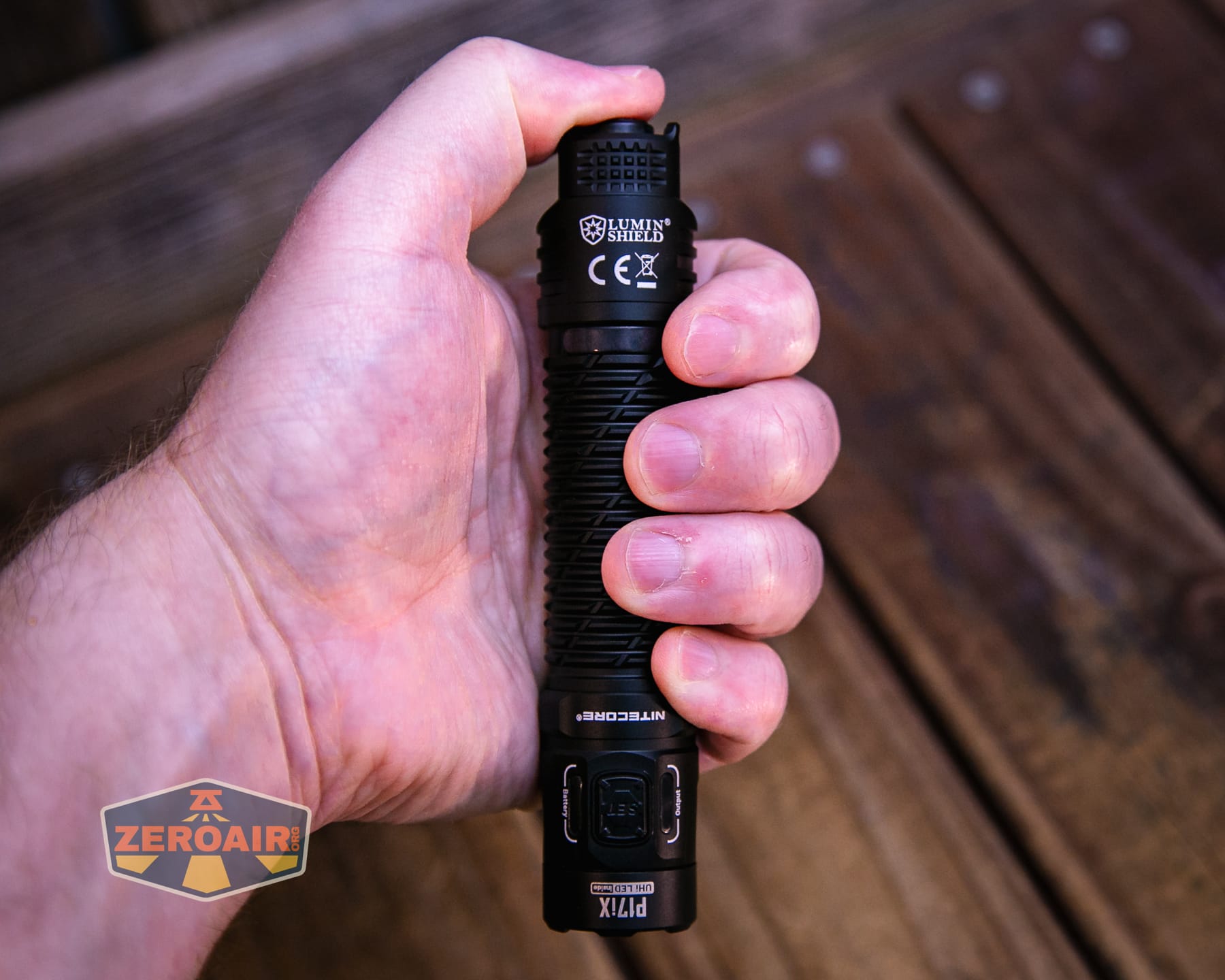 Nitecore P27iX customizable tactical flashlight in hand