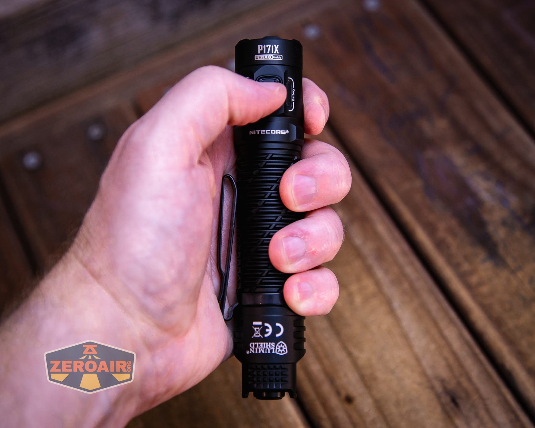Nitecore P27iX customizable tactical flashlight in hand