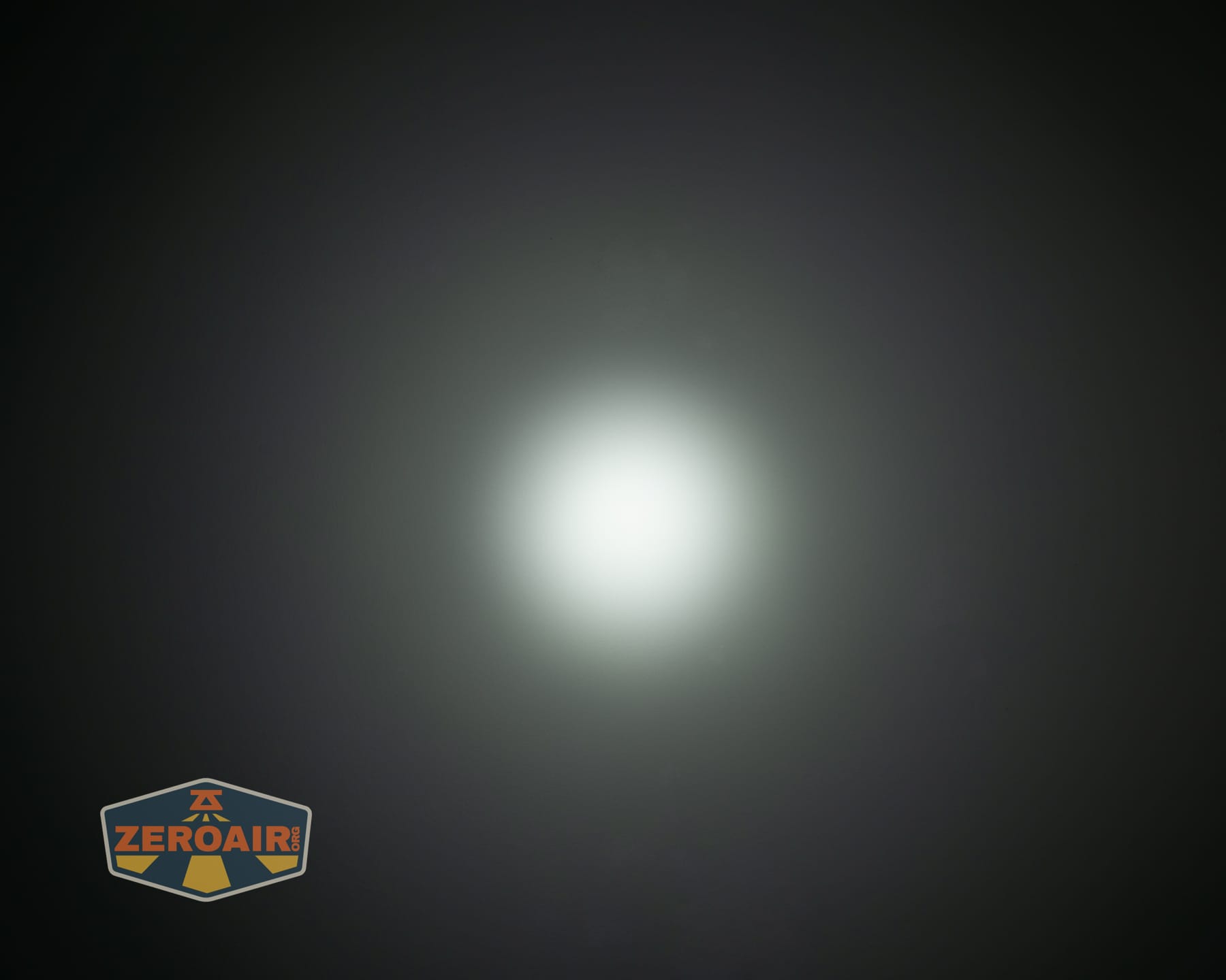 Nitecore P27iX customizable tactical flashlight emitters on ceiling
