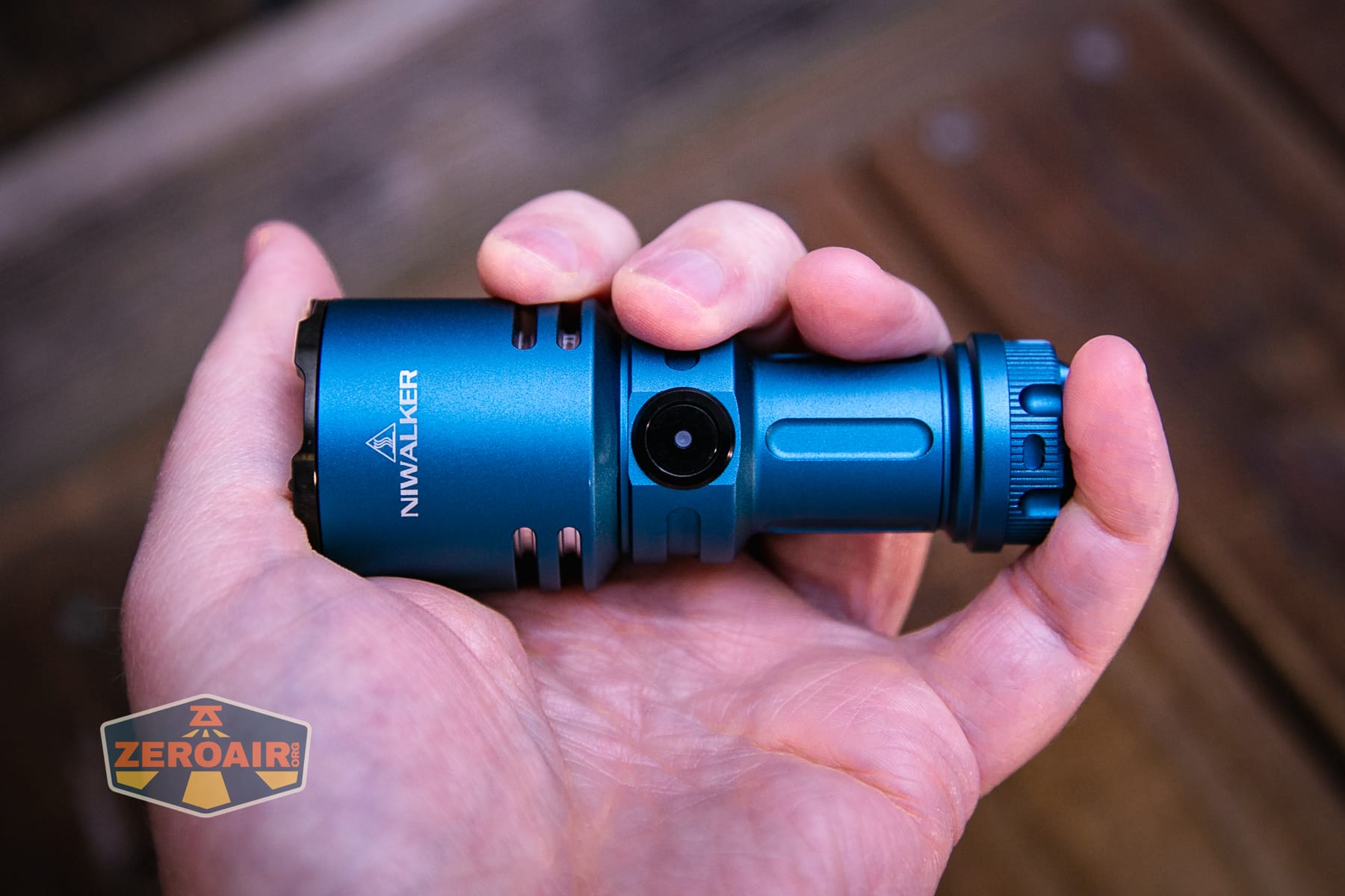 Niwalker N50S long range flashlight in hand