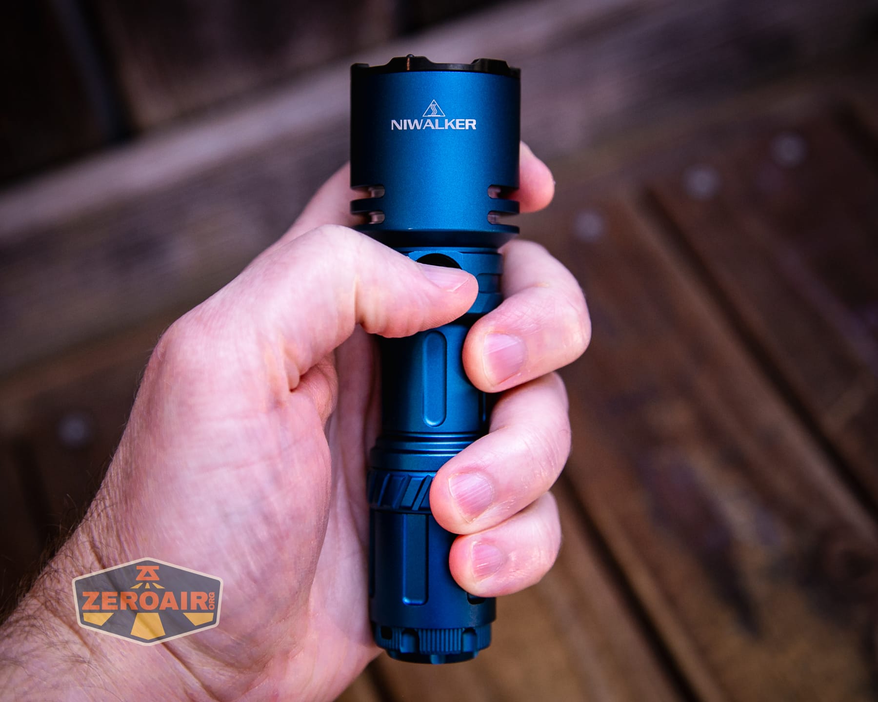 Niwalker N50S long range flashlight in hand