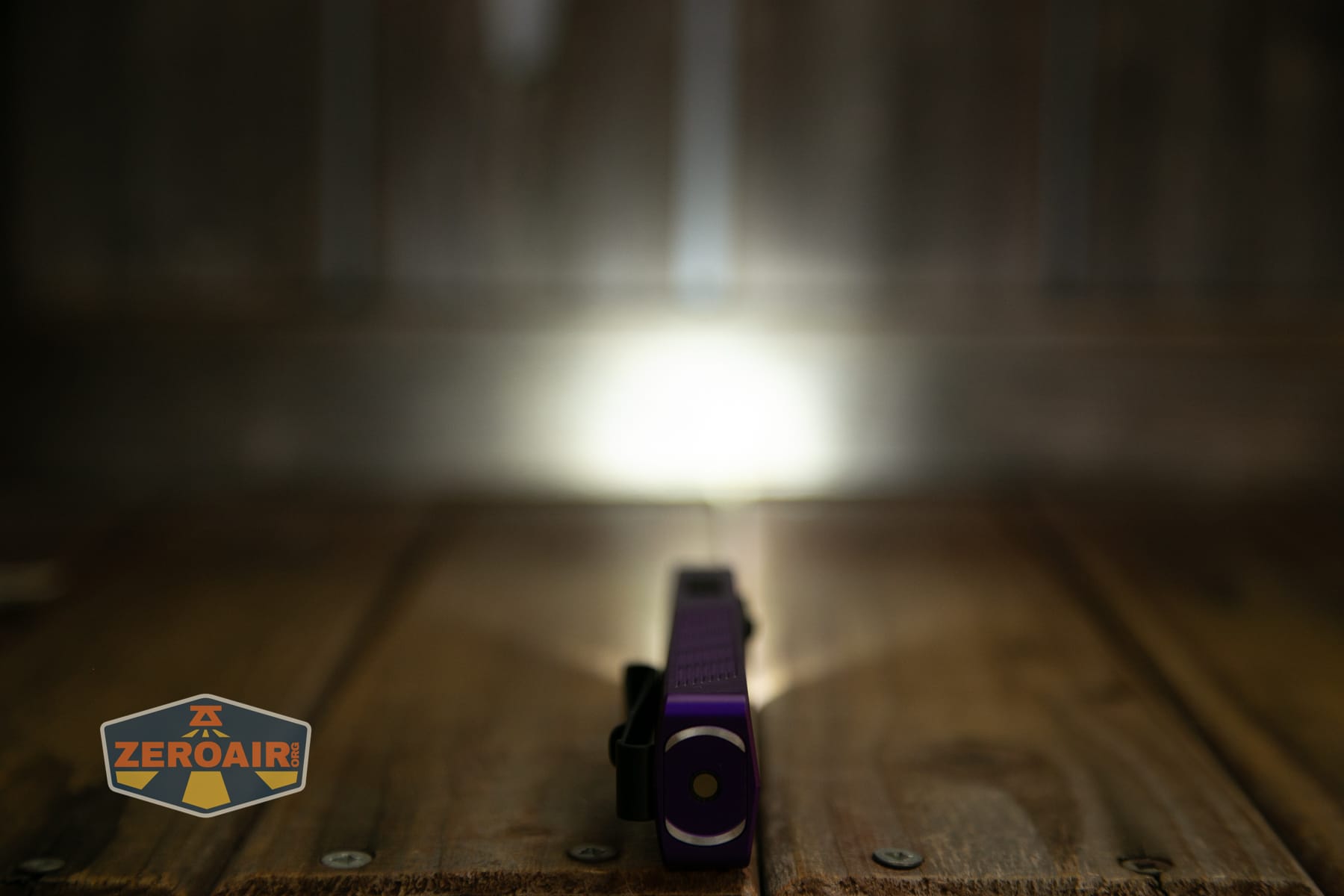 Olight ArkPro Nebula Violet Flat flashlight emitters on