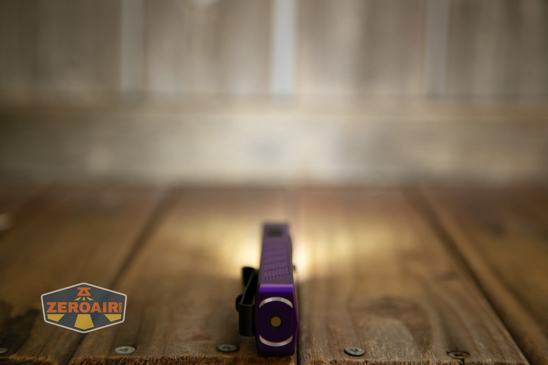 Olight ArkPro Nebula Violet Flat flashlight emitters on