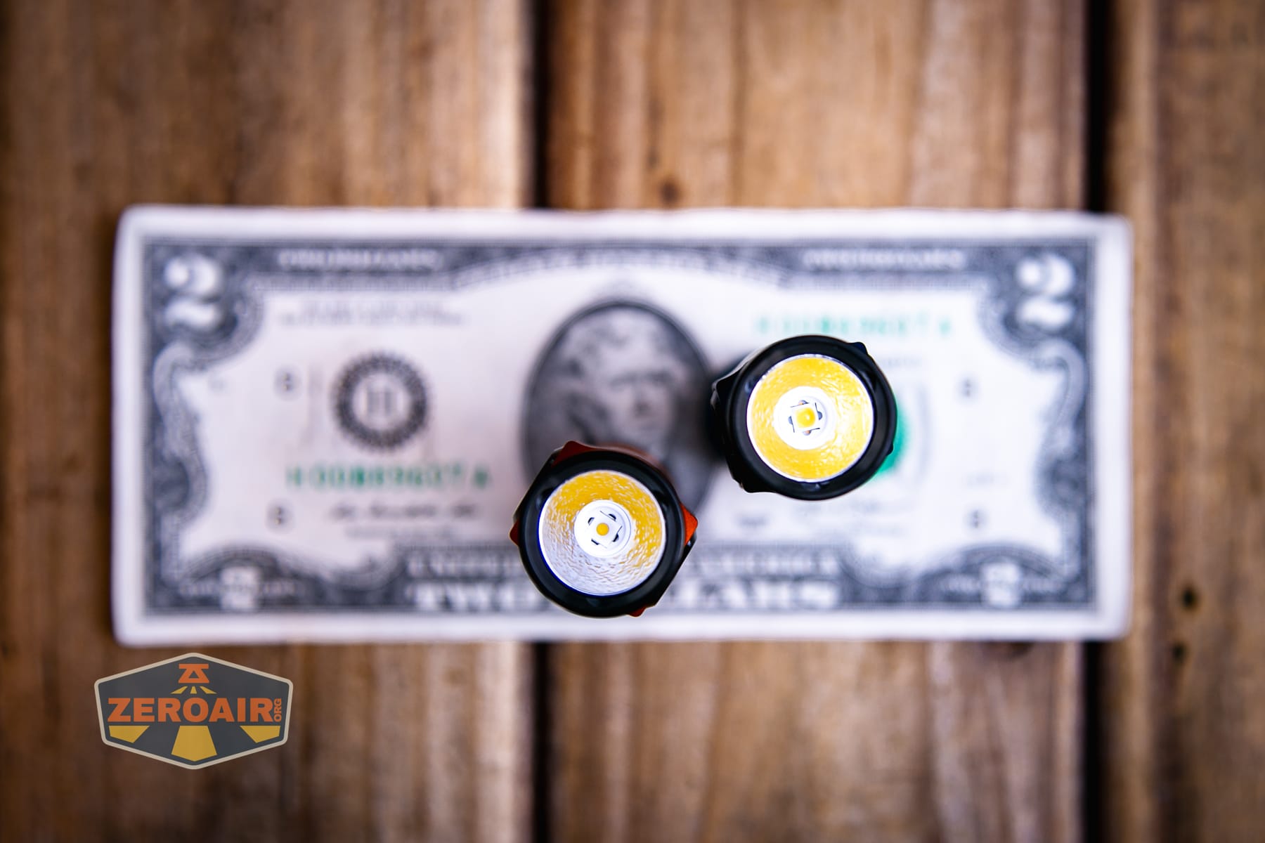 Skilhunt M150 V4 flashlight on two dollar bill