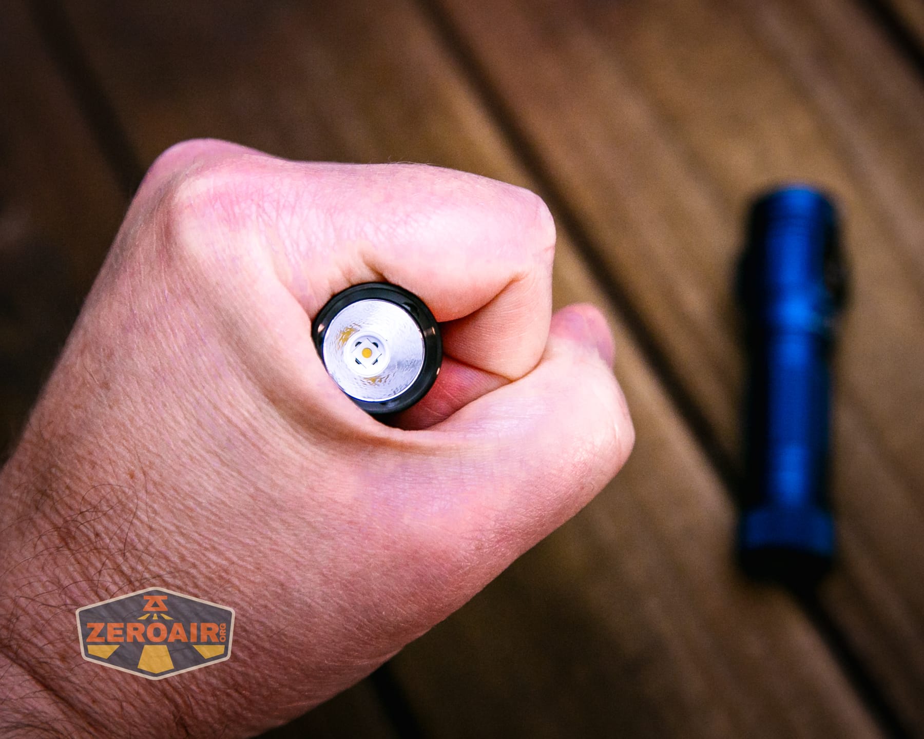 Skilhunt M150 V4 flashlight in hand