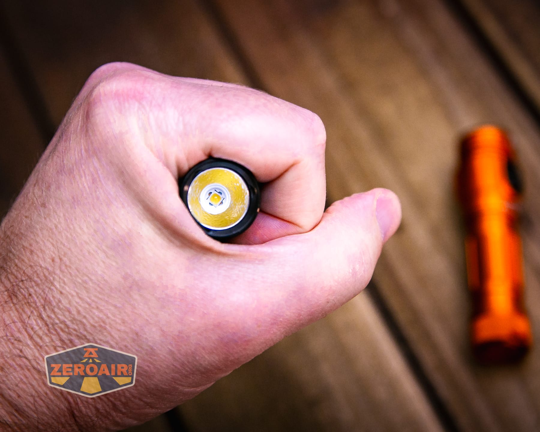 Skilhunt M150 V4 flashlight in hand