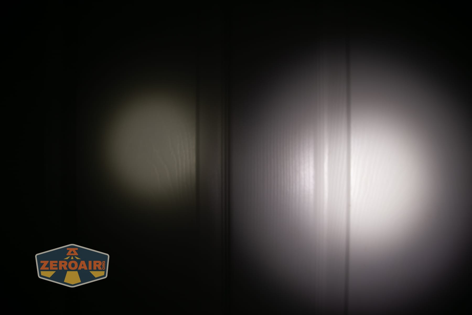 Skilhunt M150 V4 flashlight beamshots on door compared to nichia 219b