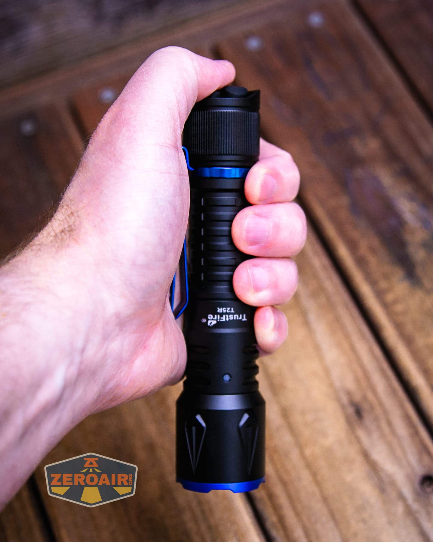 Trustfire T25R tactical flashlight in hand