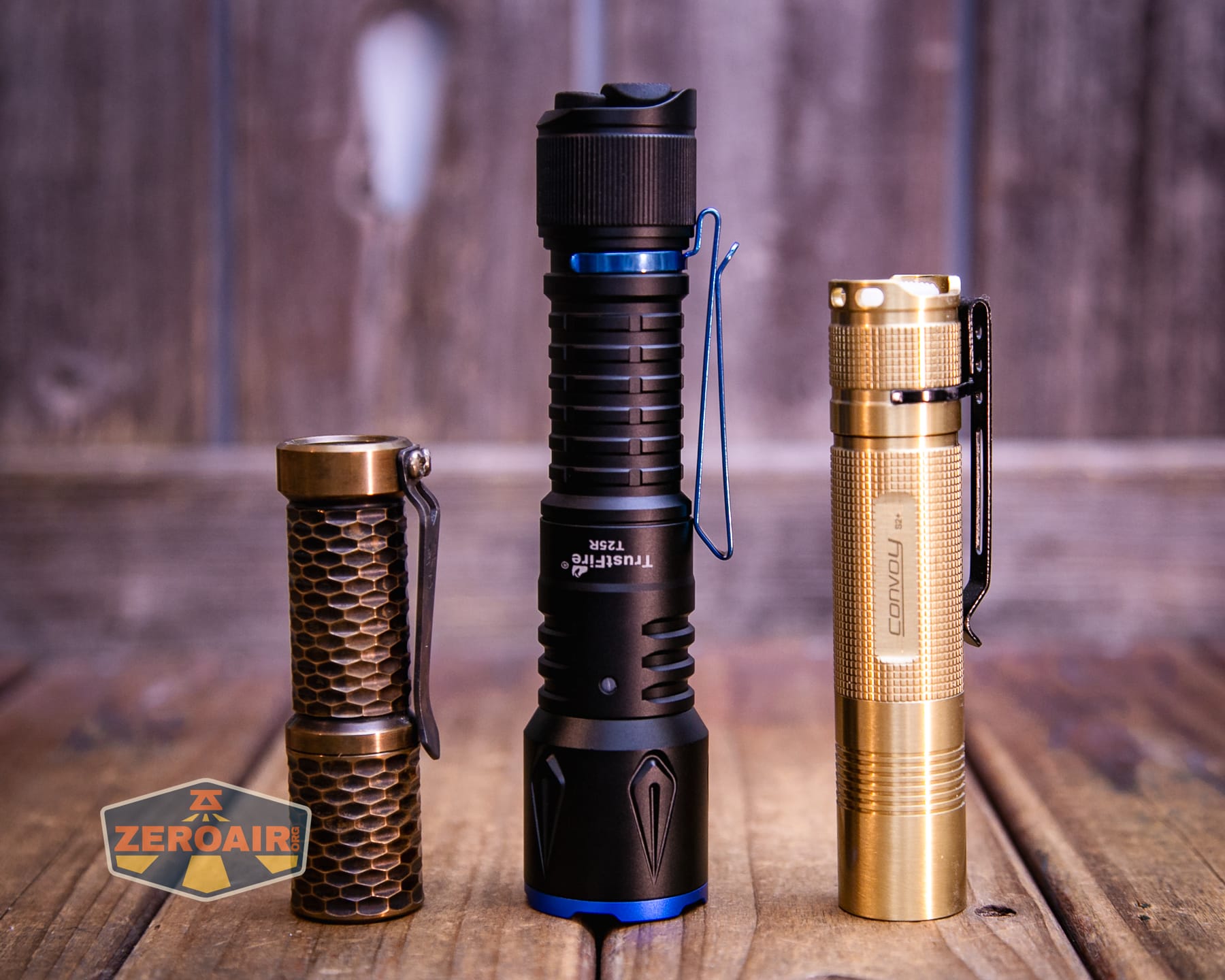 Trustfire T25R tactical flashlight with two standard sized flashlights