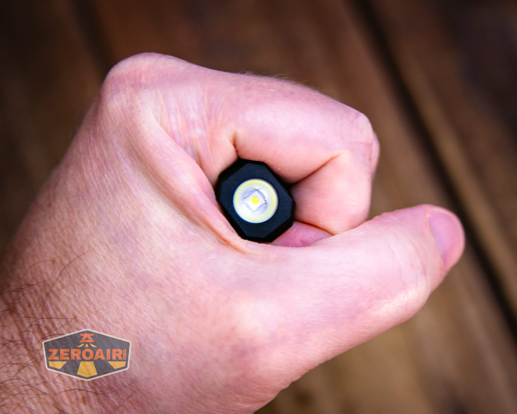 Wuben E2 Pulse keychain flashlight in hand
