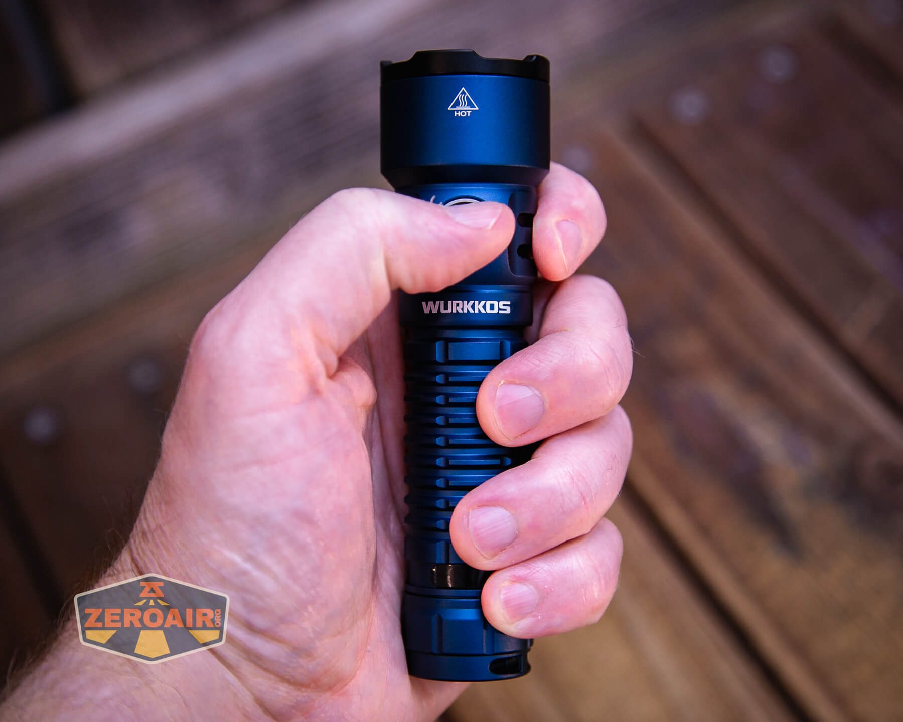 Wurkkos TS28 blue flashlight in hand