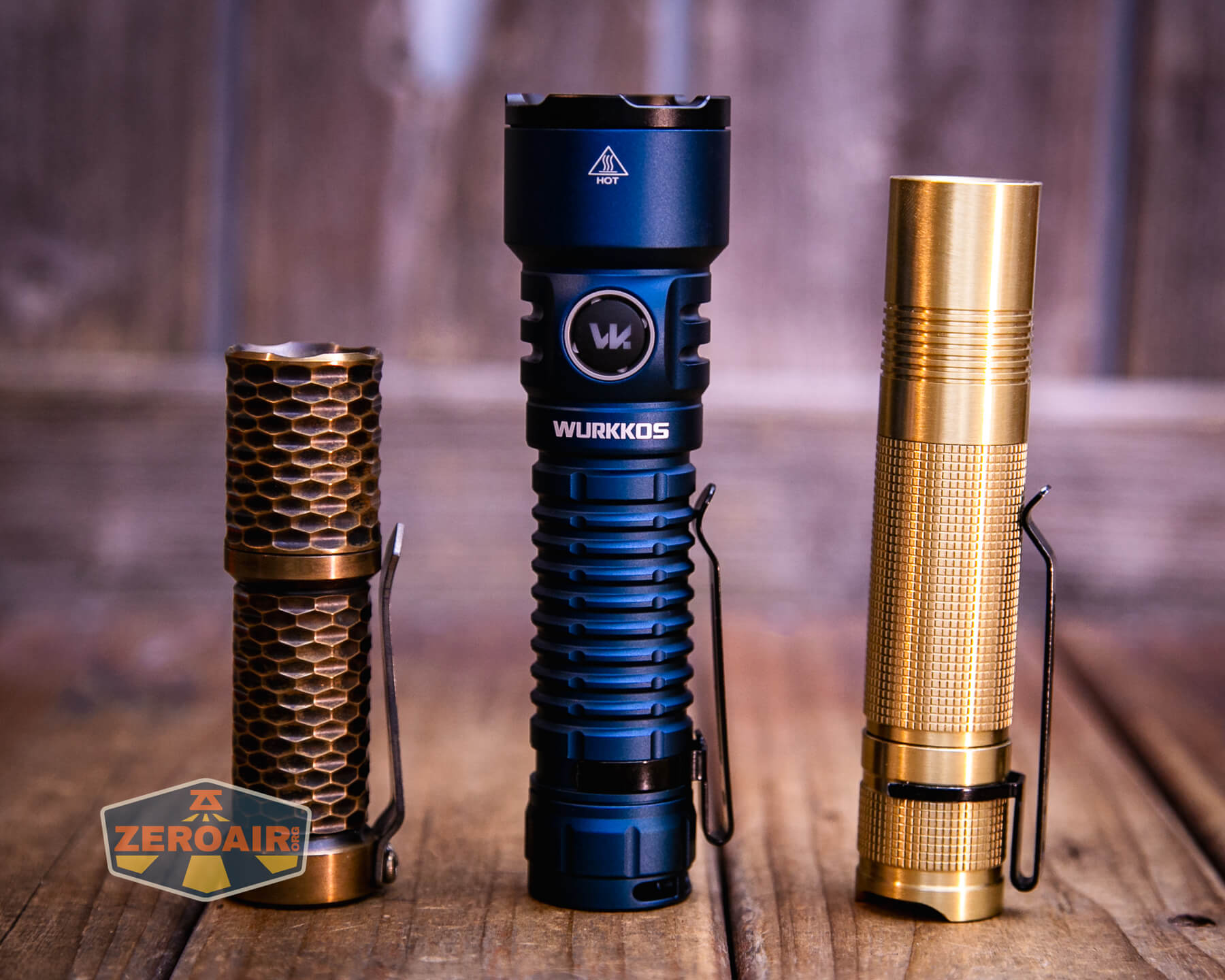 Wurkkos TS28 blue flashlight with standard-sized flashlights