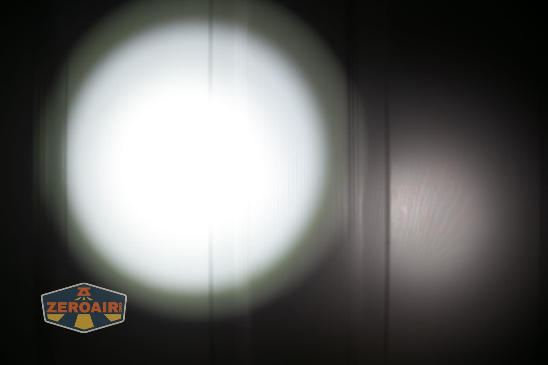 Niwalker ES01 Three Light flashlight beamshots on door (at 1') compared to nichia 219b 4500K