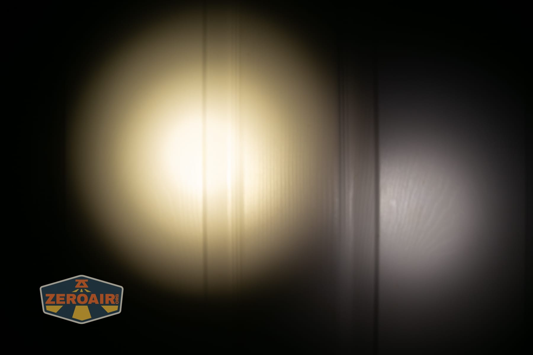 Niwalker ES01 Three Light flashlight beamshots on door (at 1') compared to nichia 219b 4500K