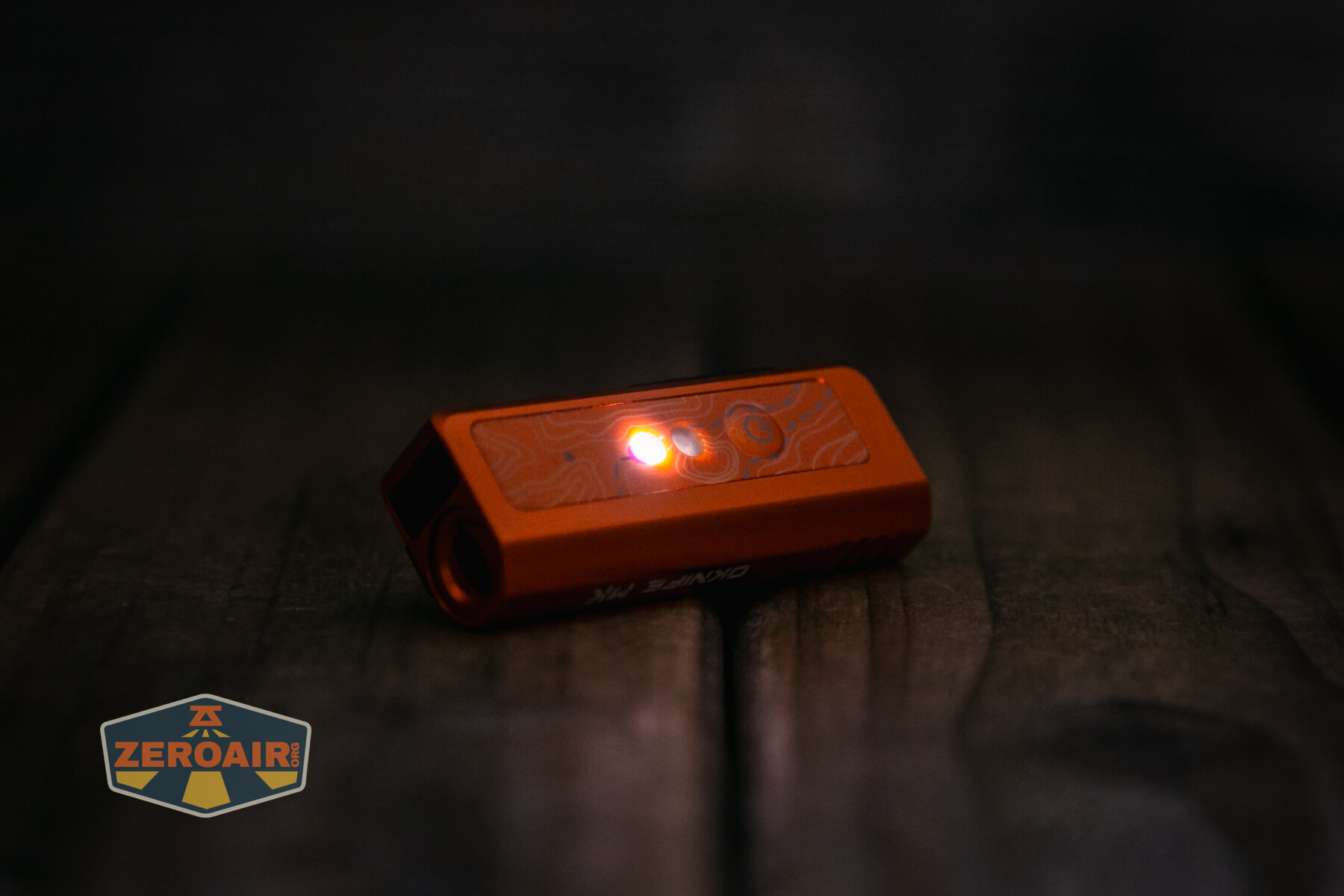 Olight Oknife MK side emitter on