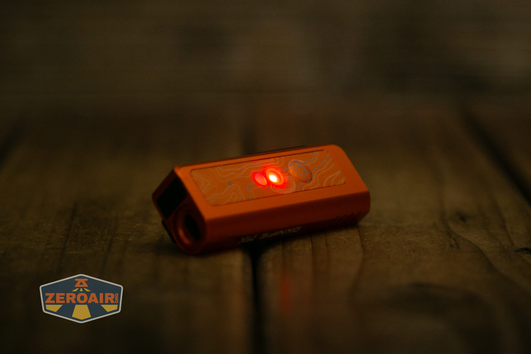 Olight Oknife MK red emitter on