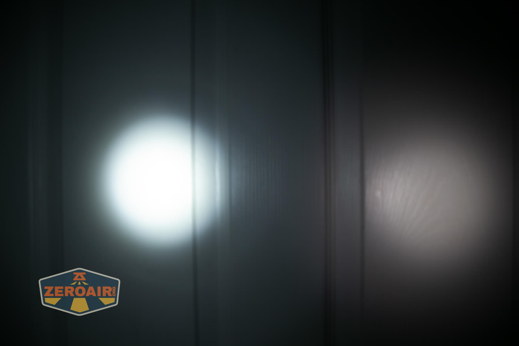 Olight Oknife MK beamshots on door (at 1') compared to nichia 219b 4500K