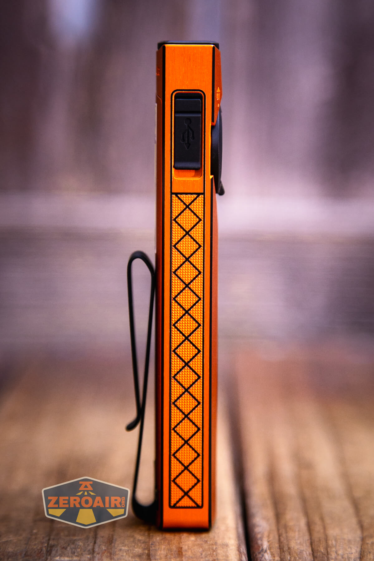 Olight ArkPro Ultra Orange flat EDC flashlight showing all sides