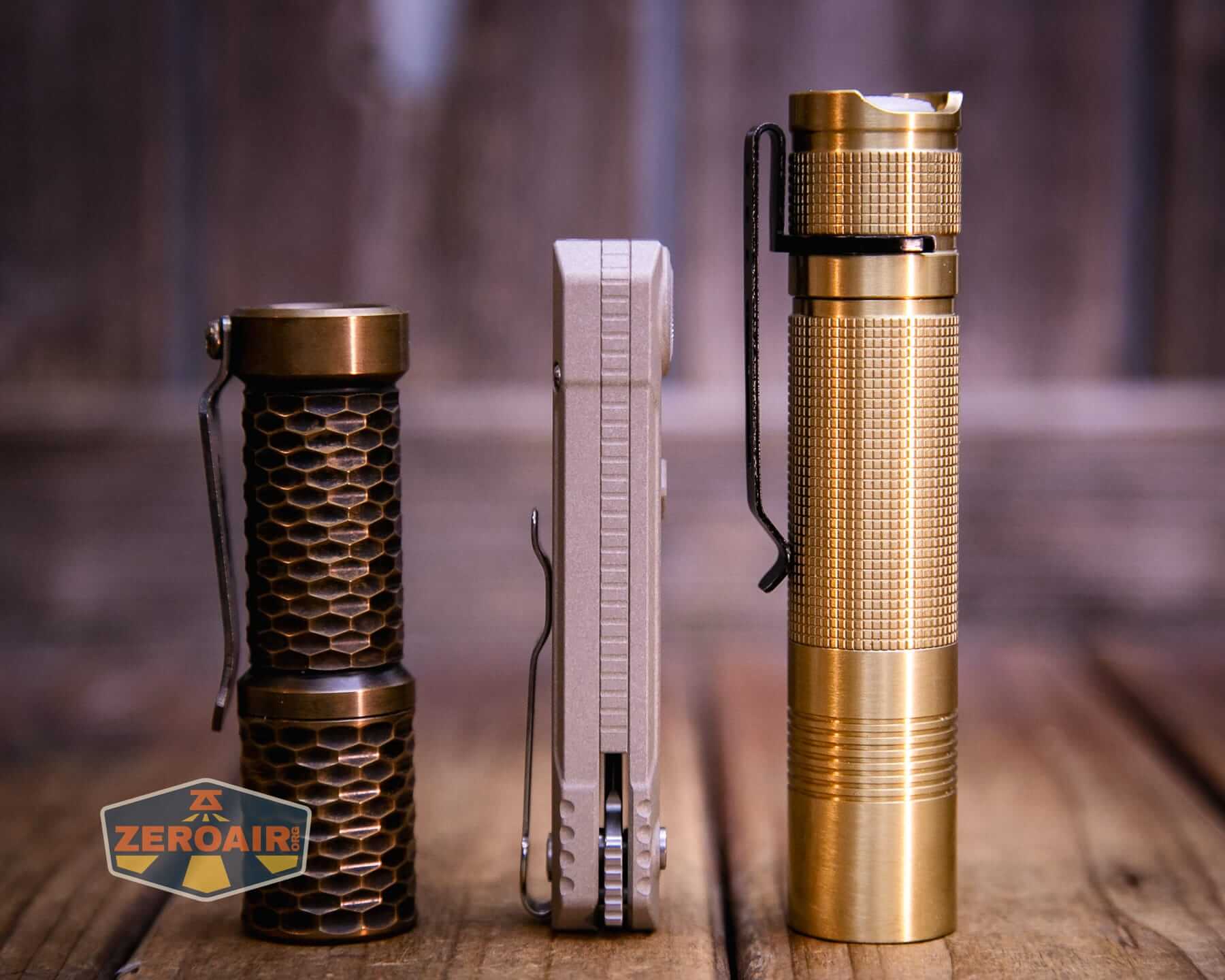 Olight Oknife LK folding knife flashlight with two standard sized flashlights