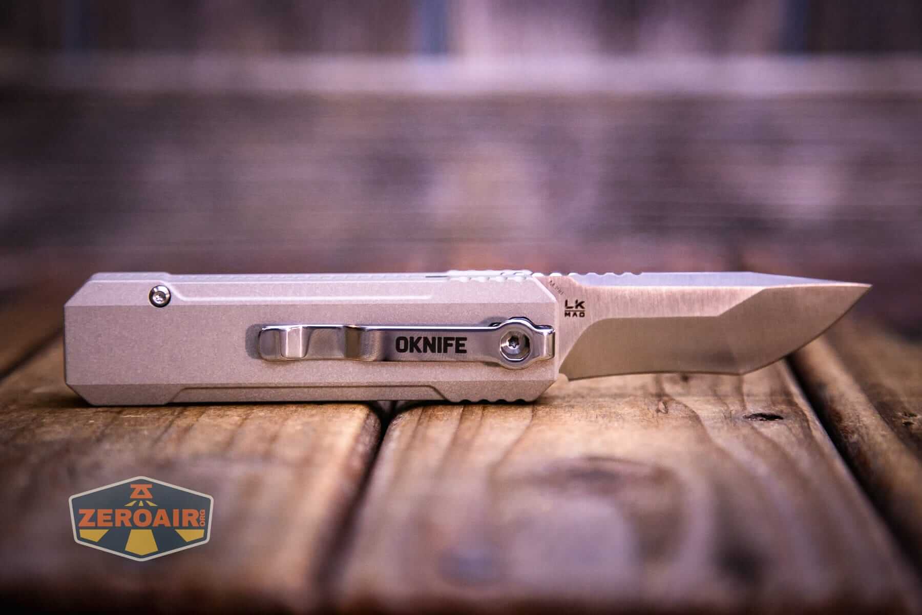 Olight Oknife LK folding knife flashlight fully open