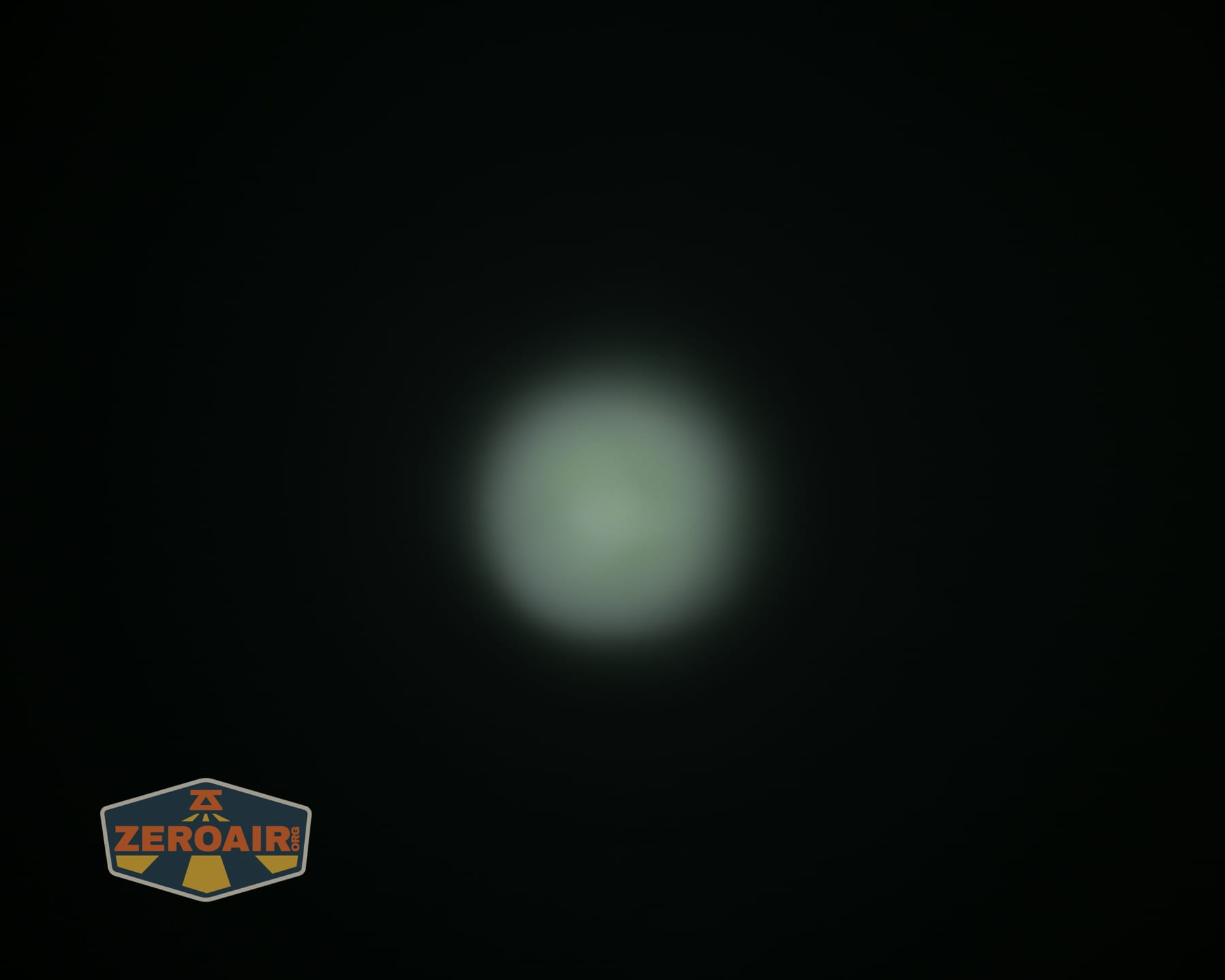 Olight Oknife LK folding knife flashlight beamshots on ceiling