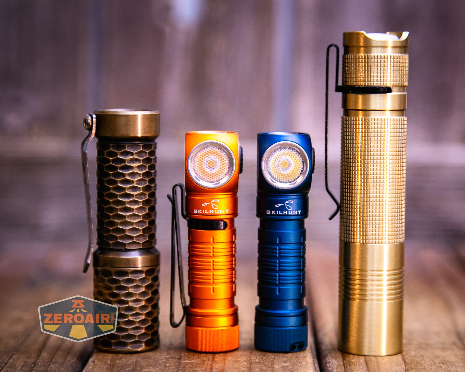 Skilhunt H150V4 headlamp with two standard sized flashlights