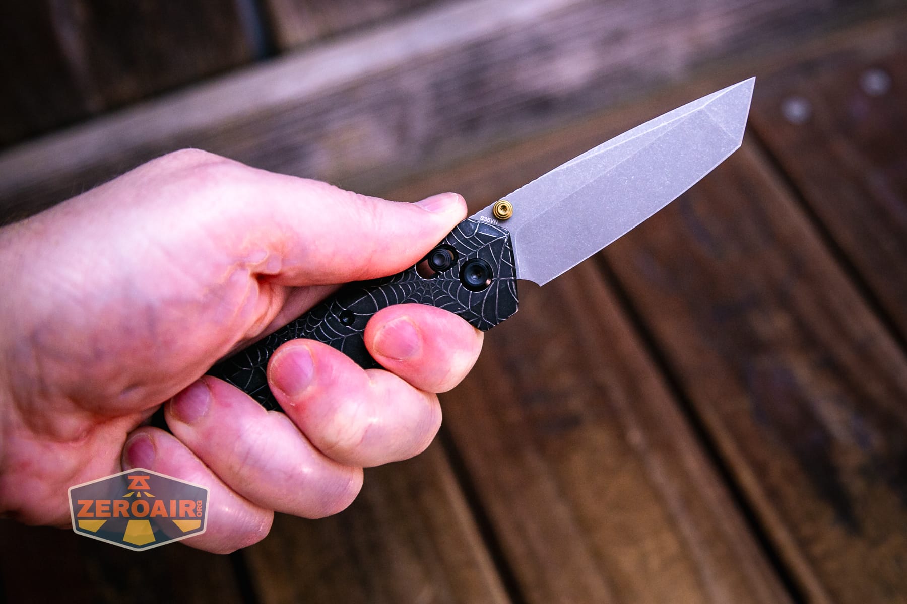 Vosteed Parallel Spiderweb knife open in hand
