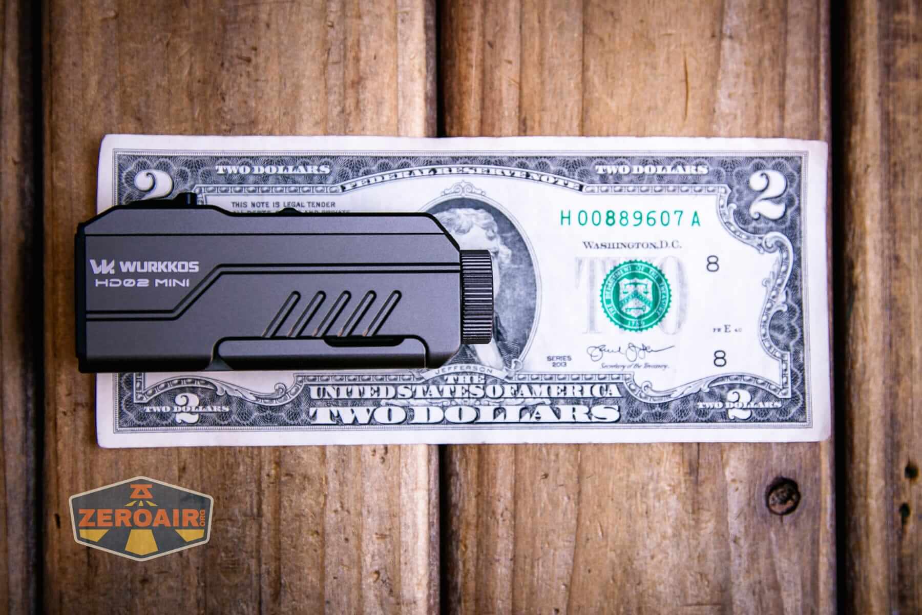 Wurkkos HD02 Mini EDC flashlight on a two dollar bill