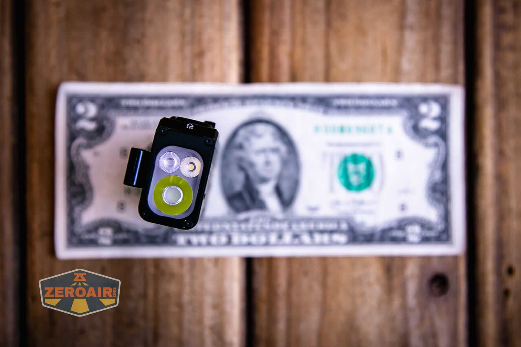 Wurkkos HD02 Mini EDC flashlight on a two dollar bill