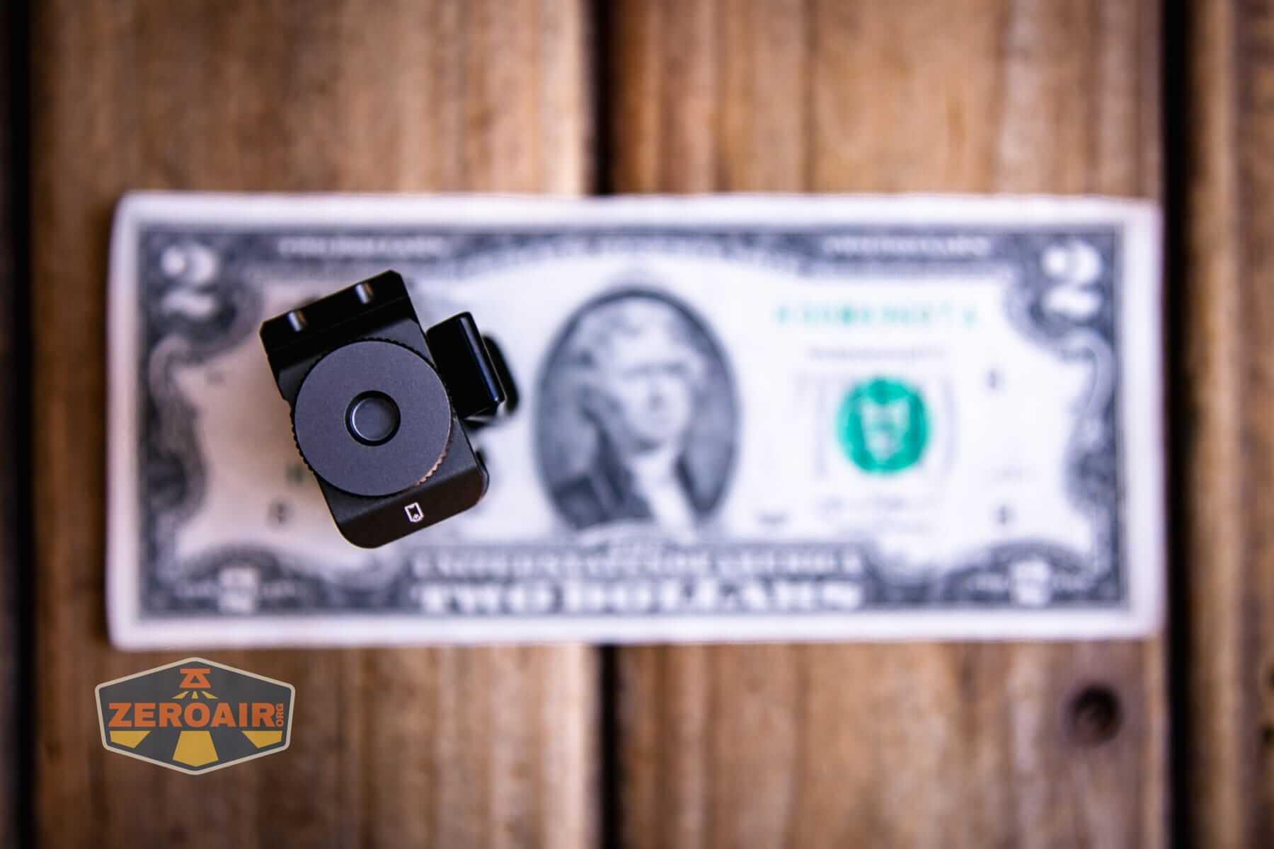 Wurkkos HD02 Mini EDC flashlight on a two dollar bill
