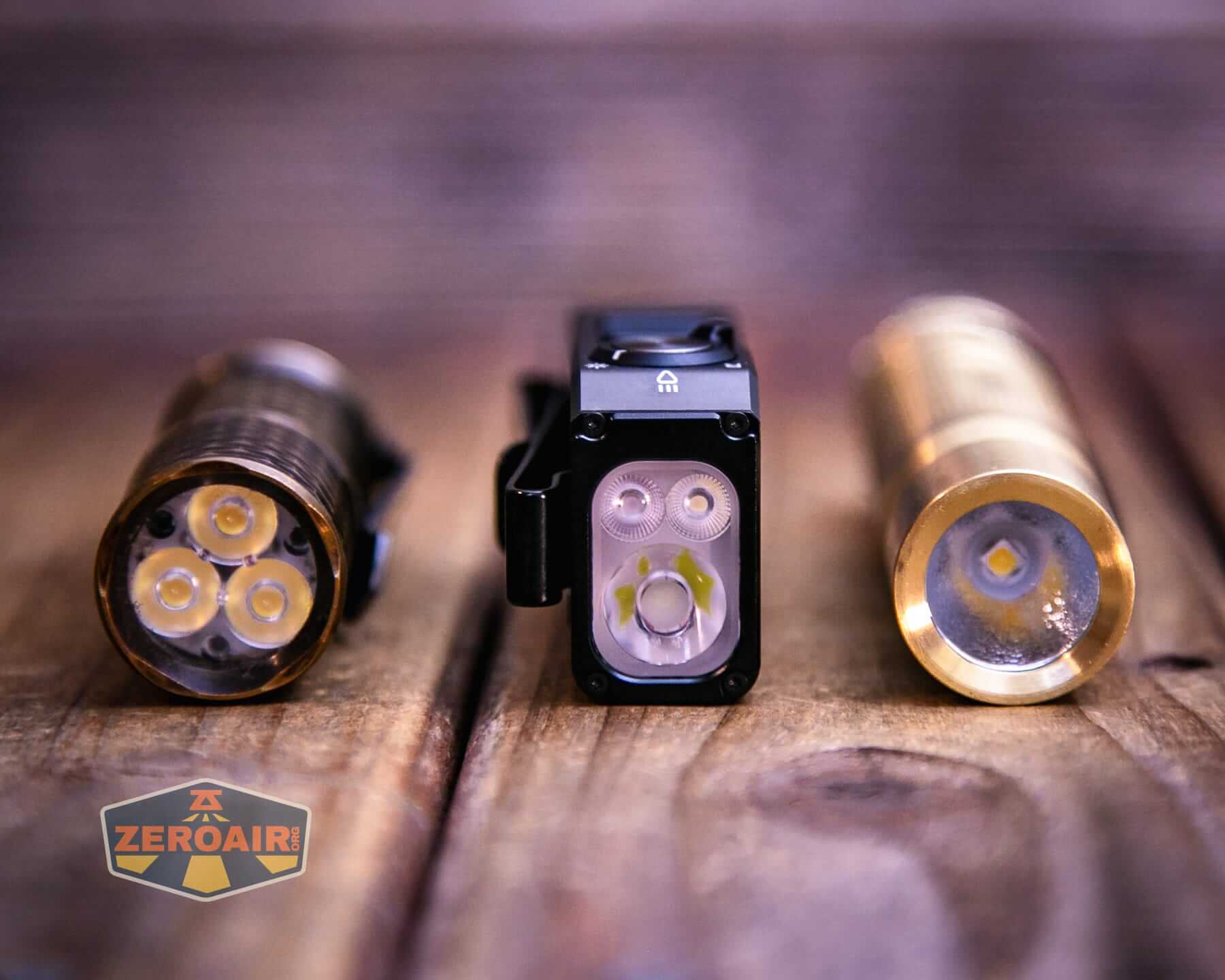 Wurkkos HD02 Mini EDC flashlight with two standard sized flashlights