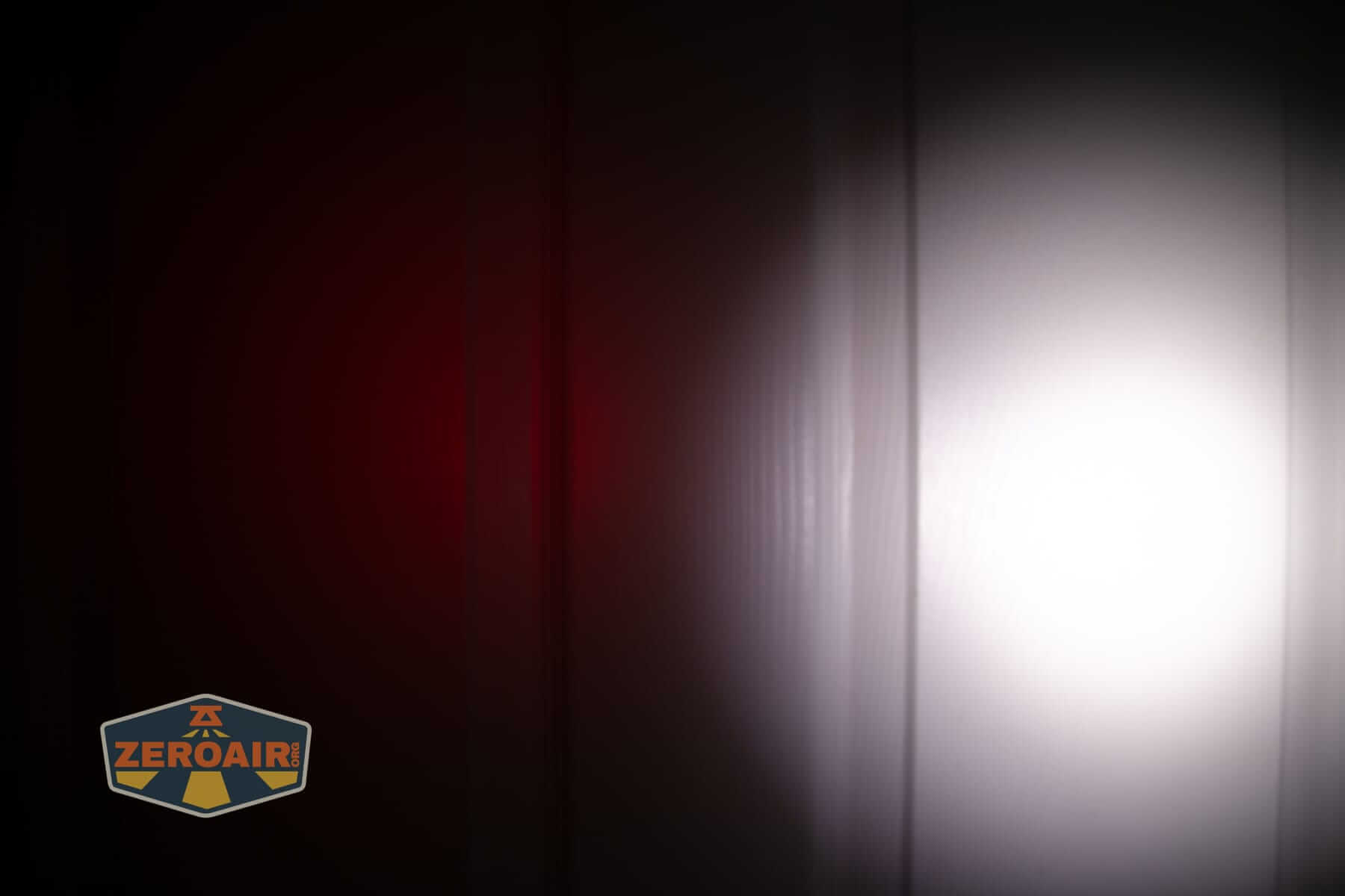 Wurkkos HD02 Mini EDC flashlight beamshots on door (at 1') compared to nichia 219b 4500K