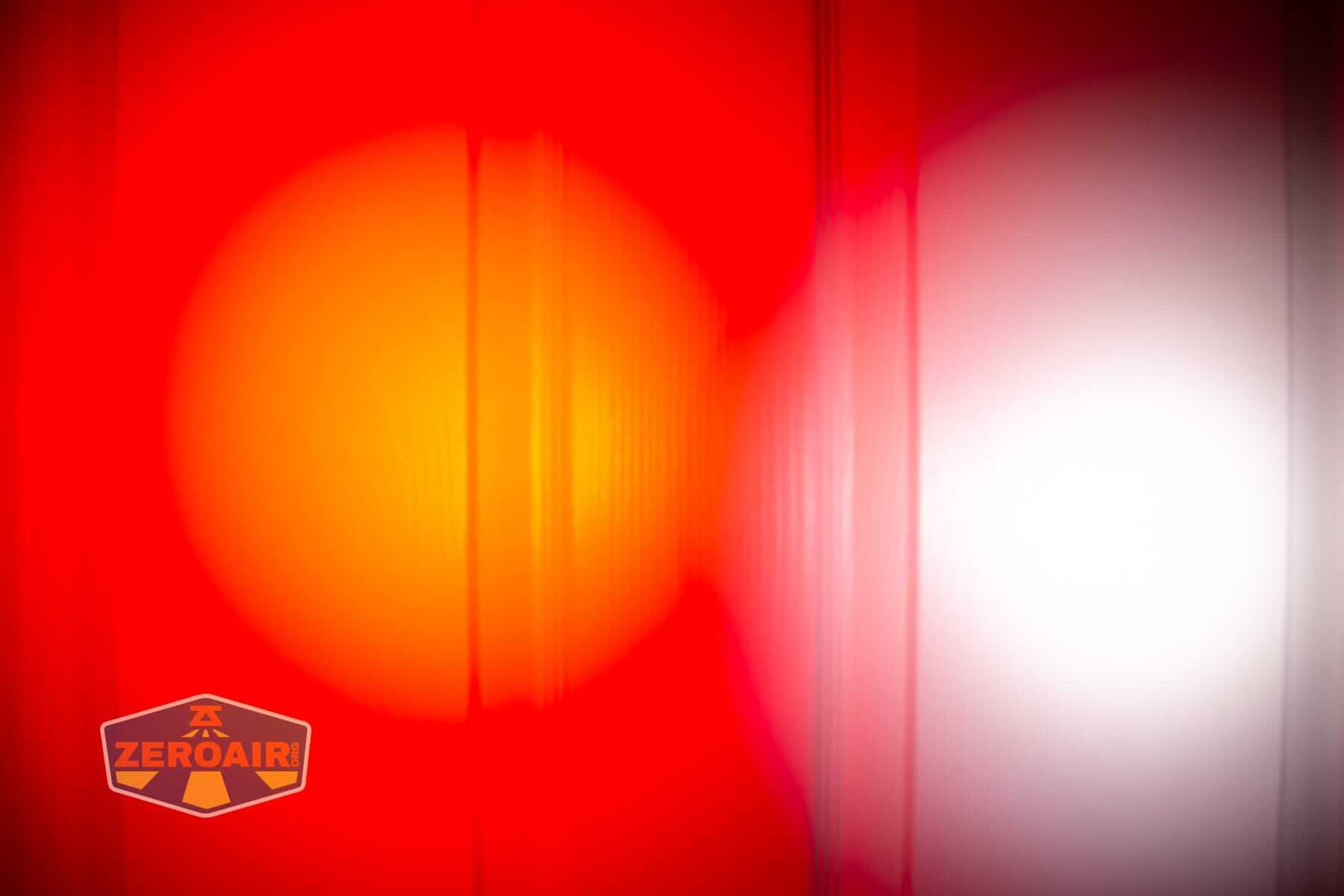 Wurkkos HD02 Mini EDC flashlight beamshots on door (at 1') compared to nichia 219b 4500K