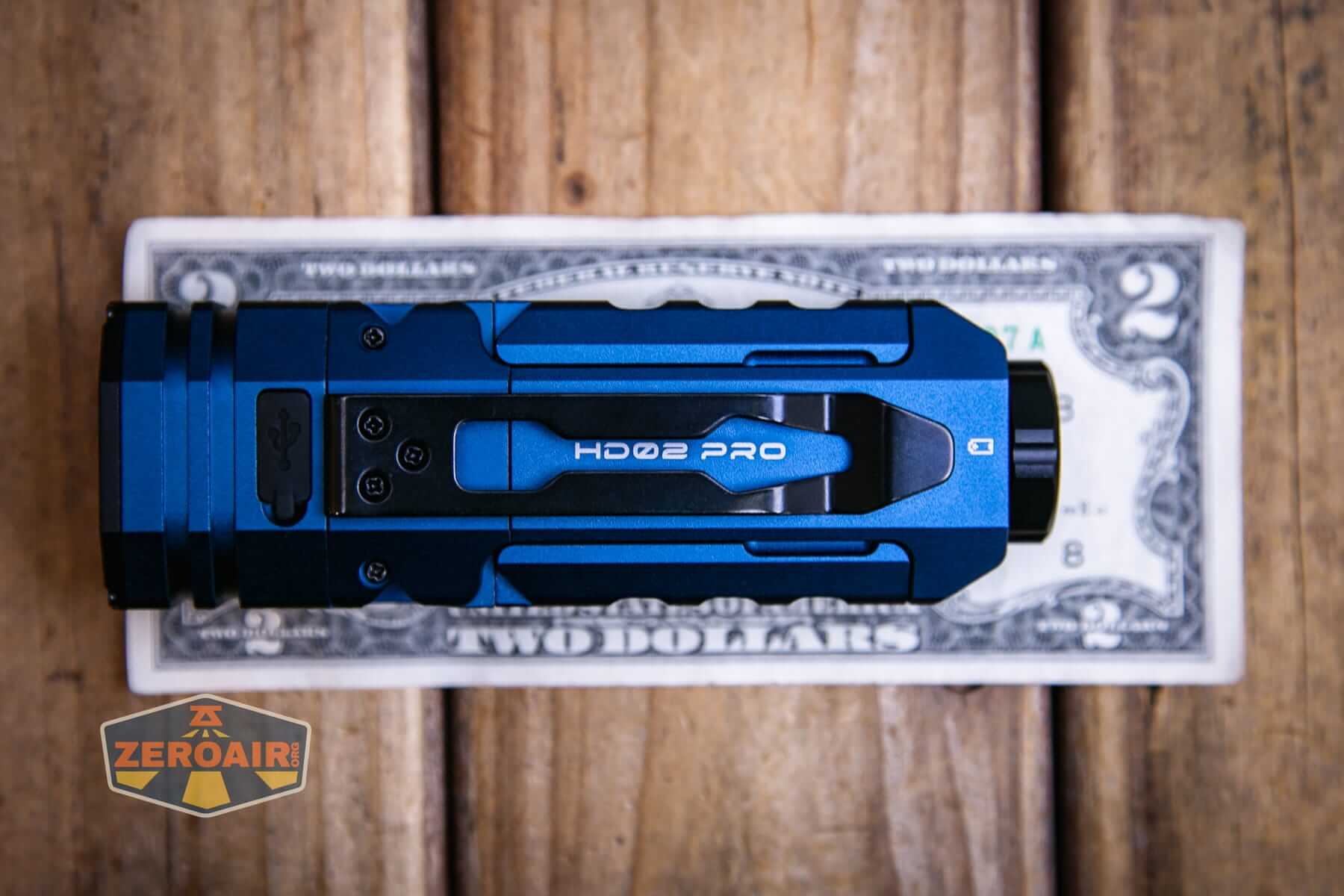 Wurkkos HD02 Pro flashlight on a two dollar bill