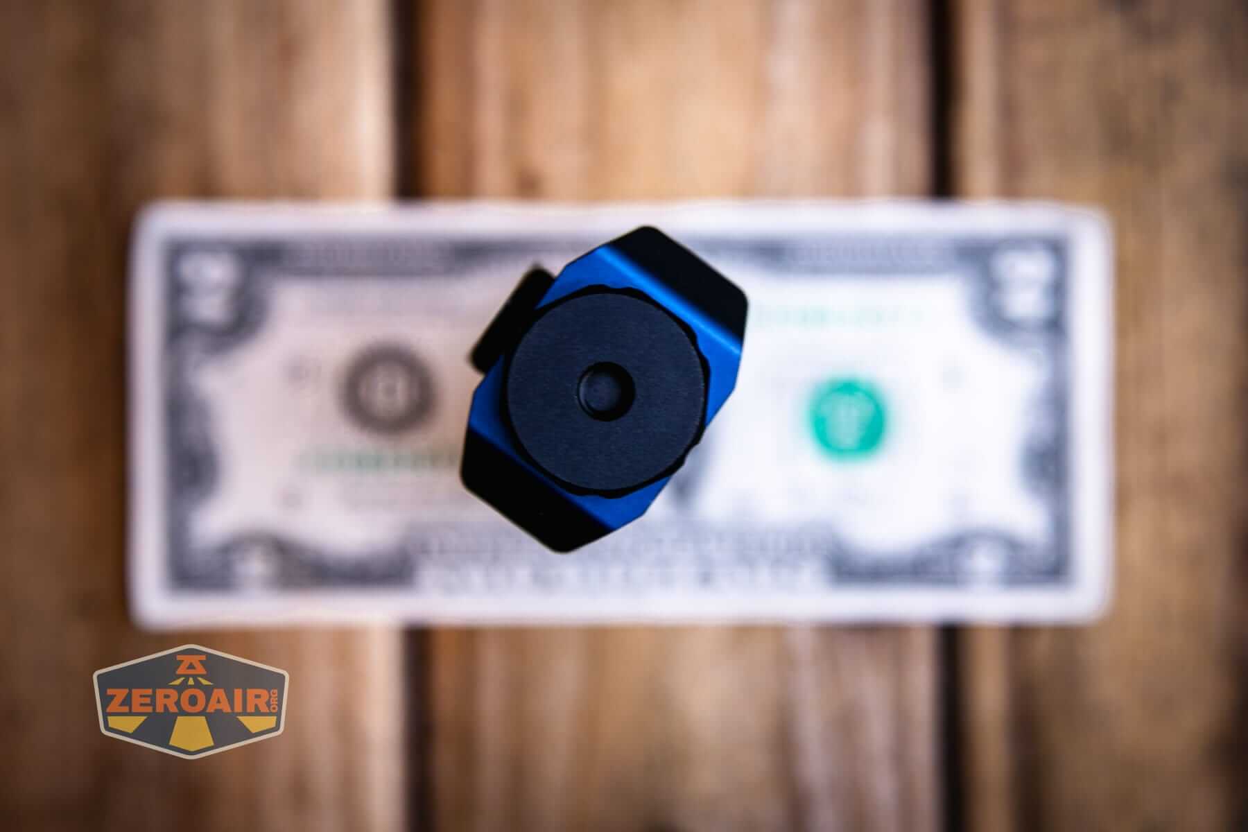 Wurkkos HD02 Pro flashlight on a two dollar bill