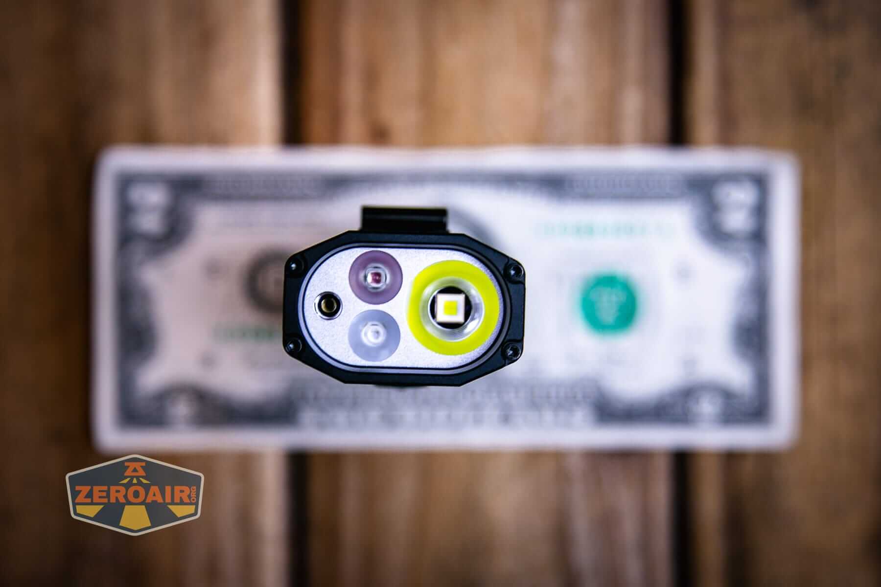 Wurkkos HD02 Pro flashlight on a two dollar bill