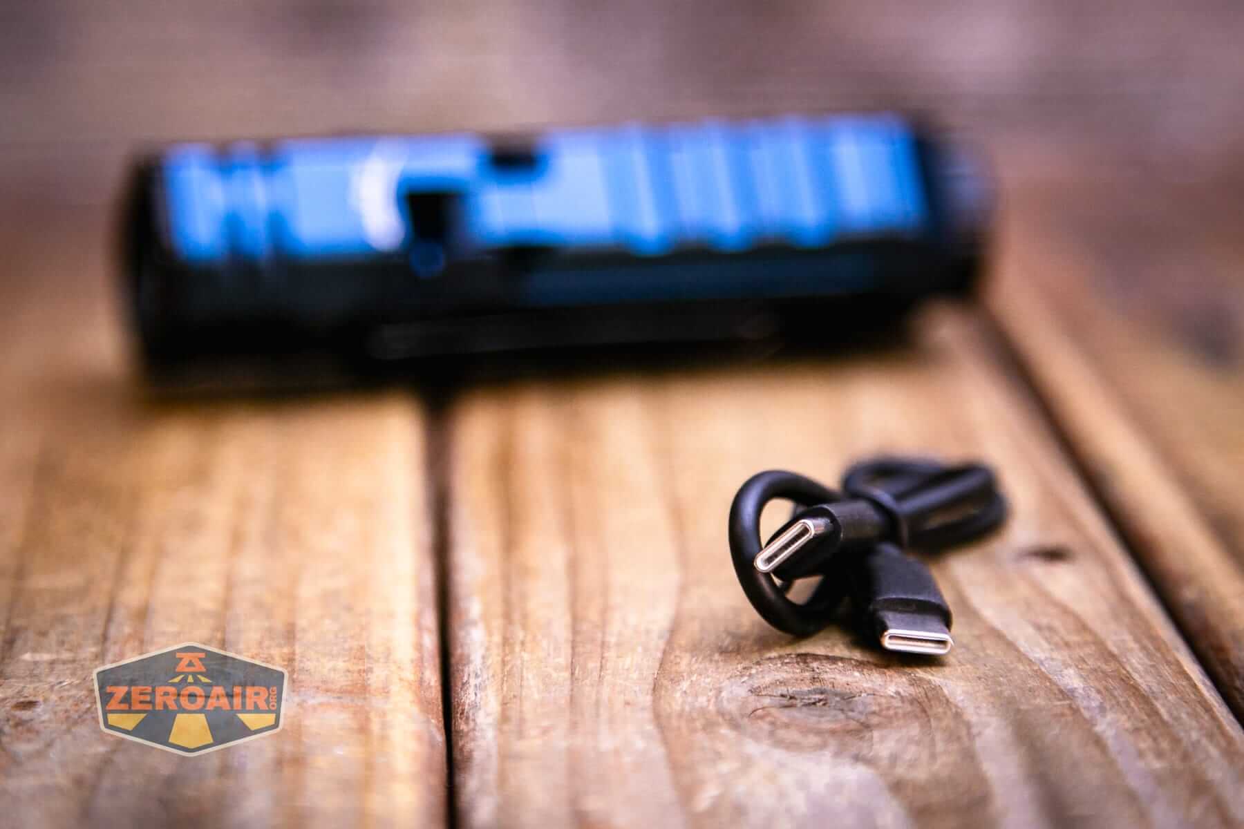 Wurkkos HD02 Pro flashlight with charging cable