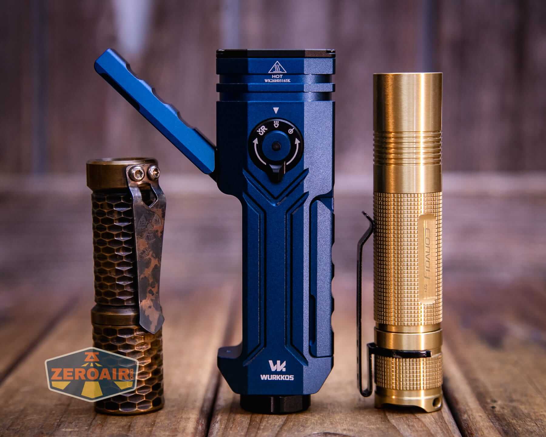 Wurkkos HD02 Pro flashlight with two standard sized flashlights