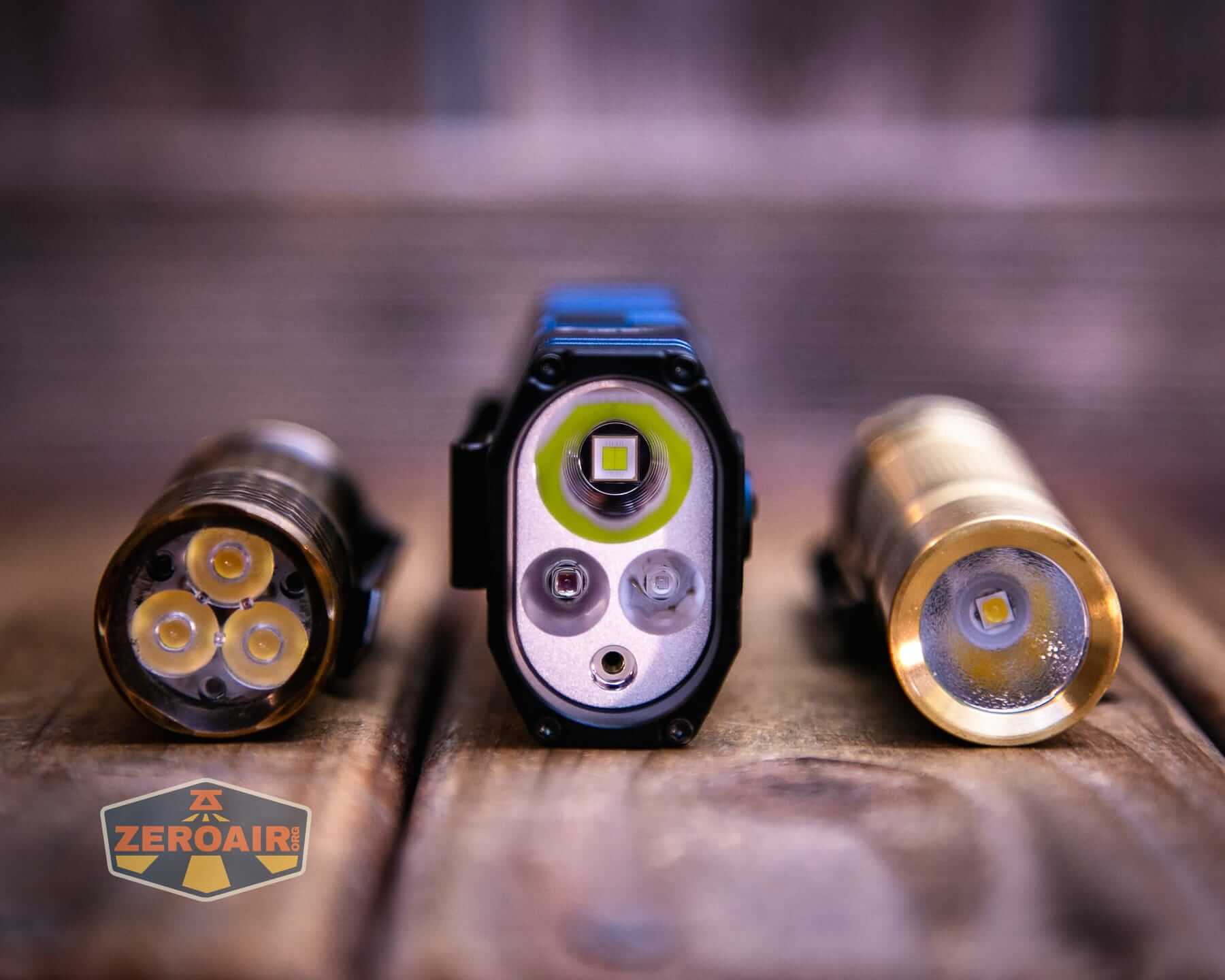 Wurkkos HD02 Pro flashlight with two standard sized flashlights